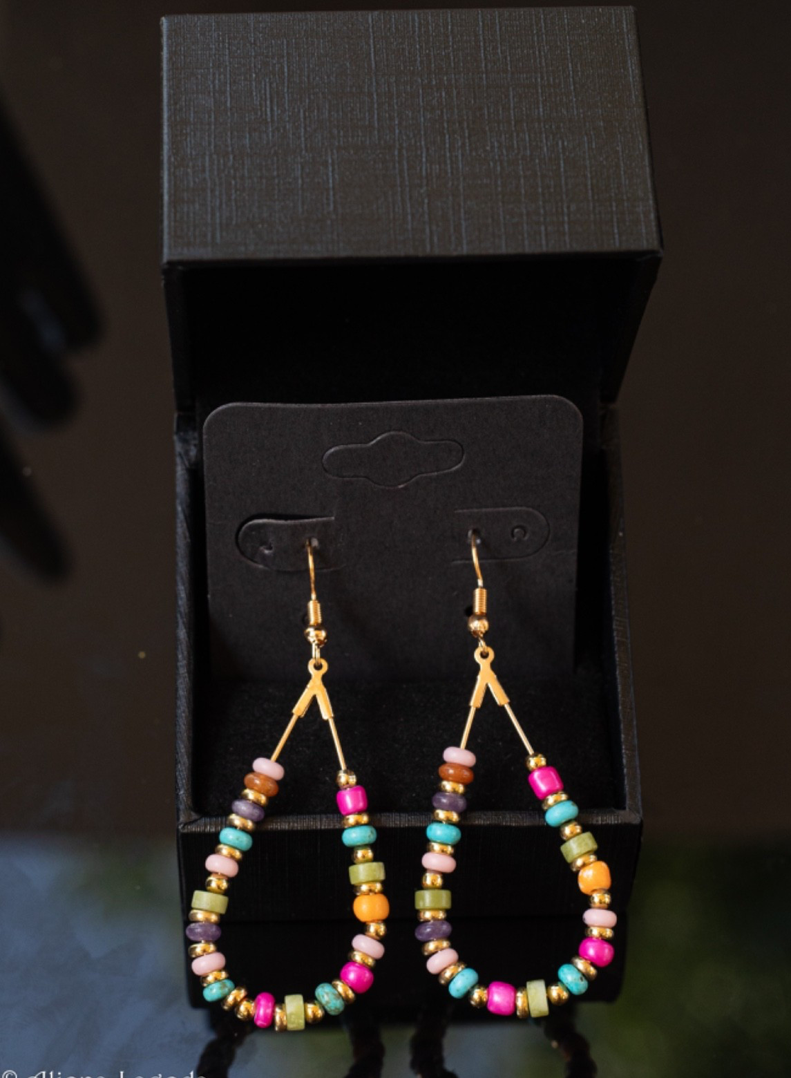 1.75-inch Beaded Drop Hoop Earrings. (20).
