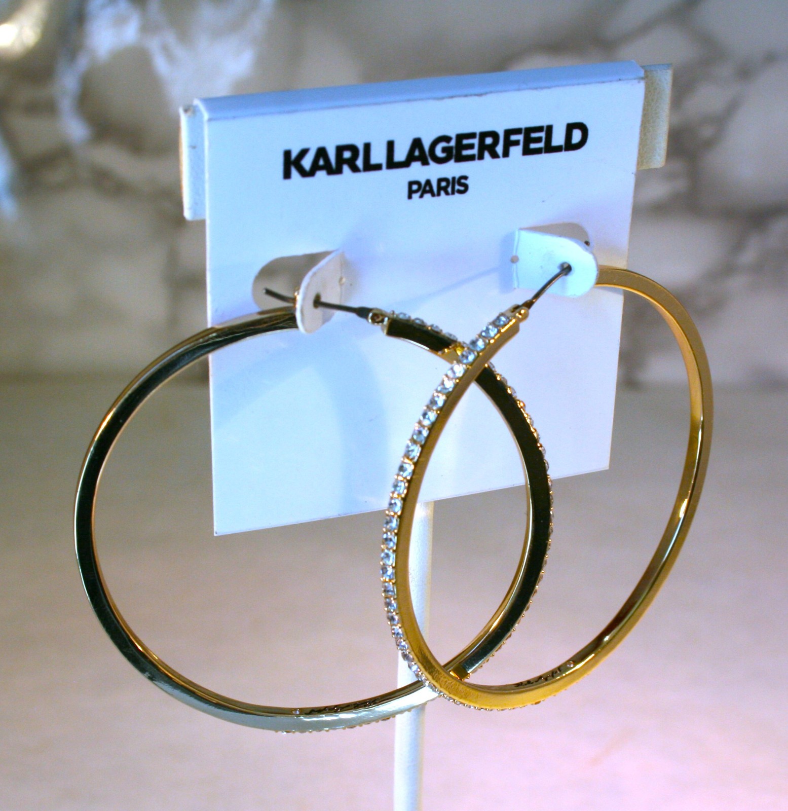 Karl Lagerfeld Paris gold tone Pave crystal edged Hoop Earrings 2 1/2″