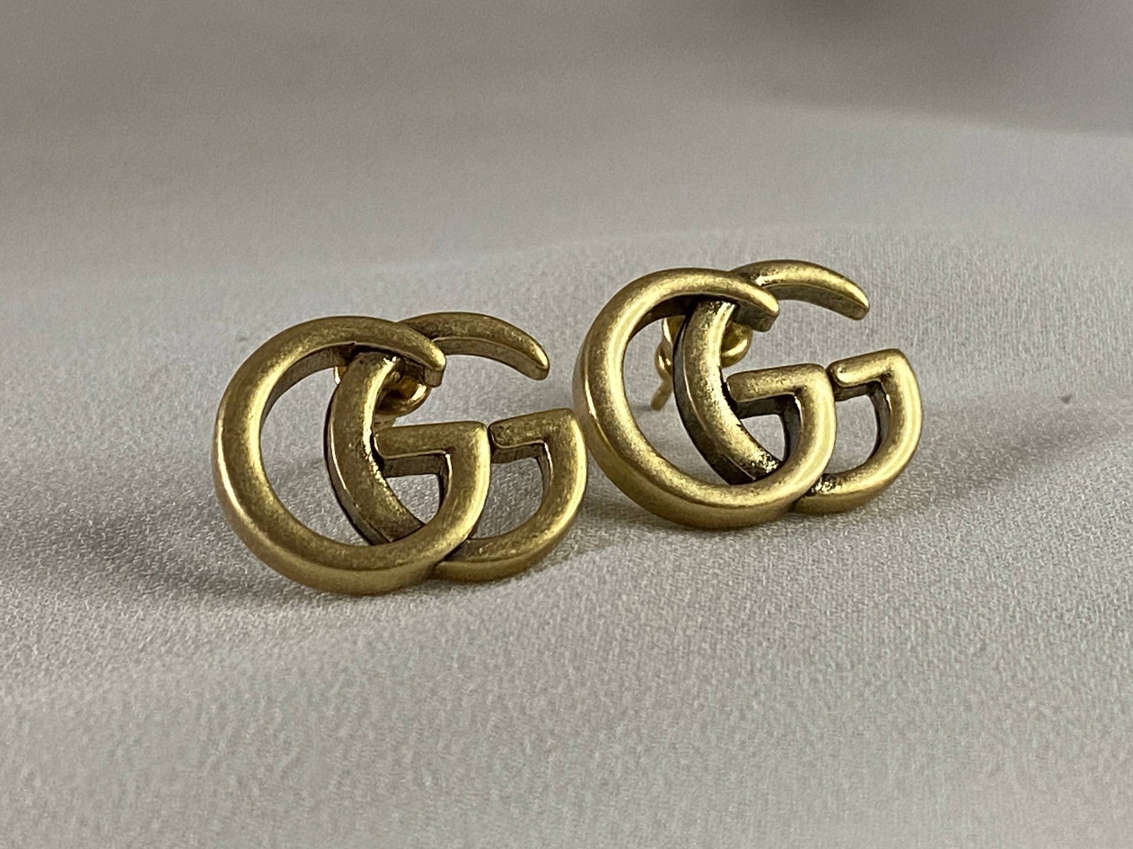 Gucci Interlocking GG Logo Stud Earrings Gold Tone Made in Italy