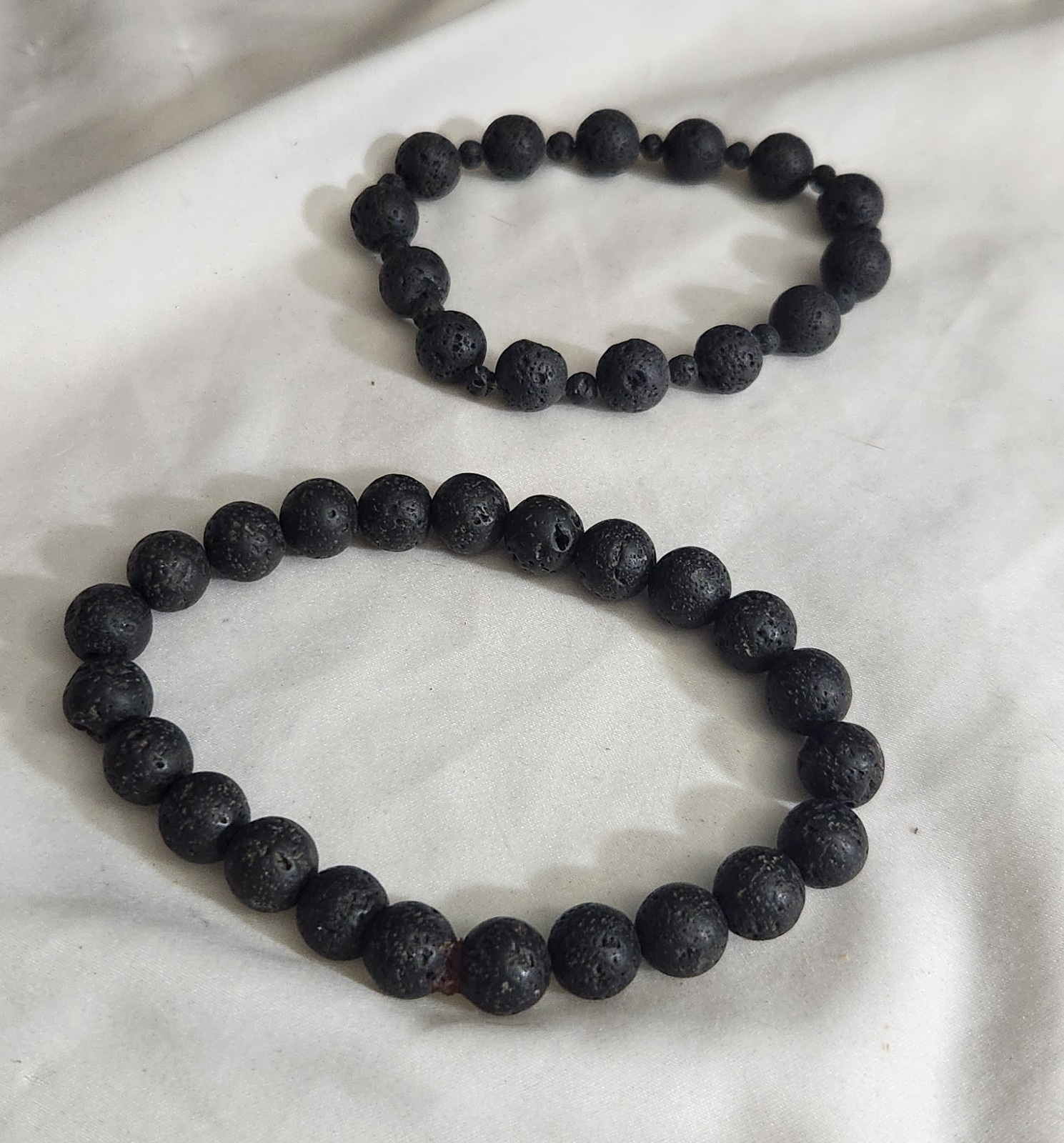 TWO BLACK LAVA STRETCH BRACELETS