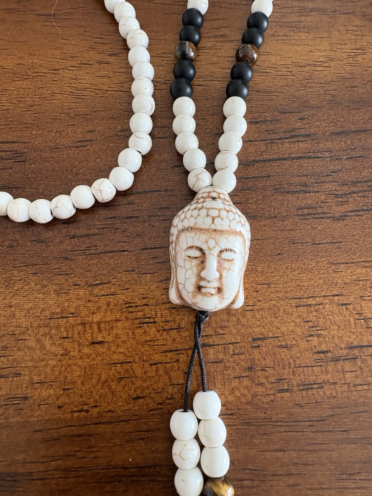 White, Brown & Ivory Look Beaded Necklace With Buddha Head &Tassels