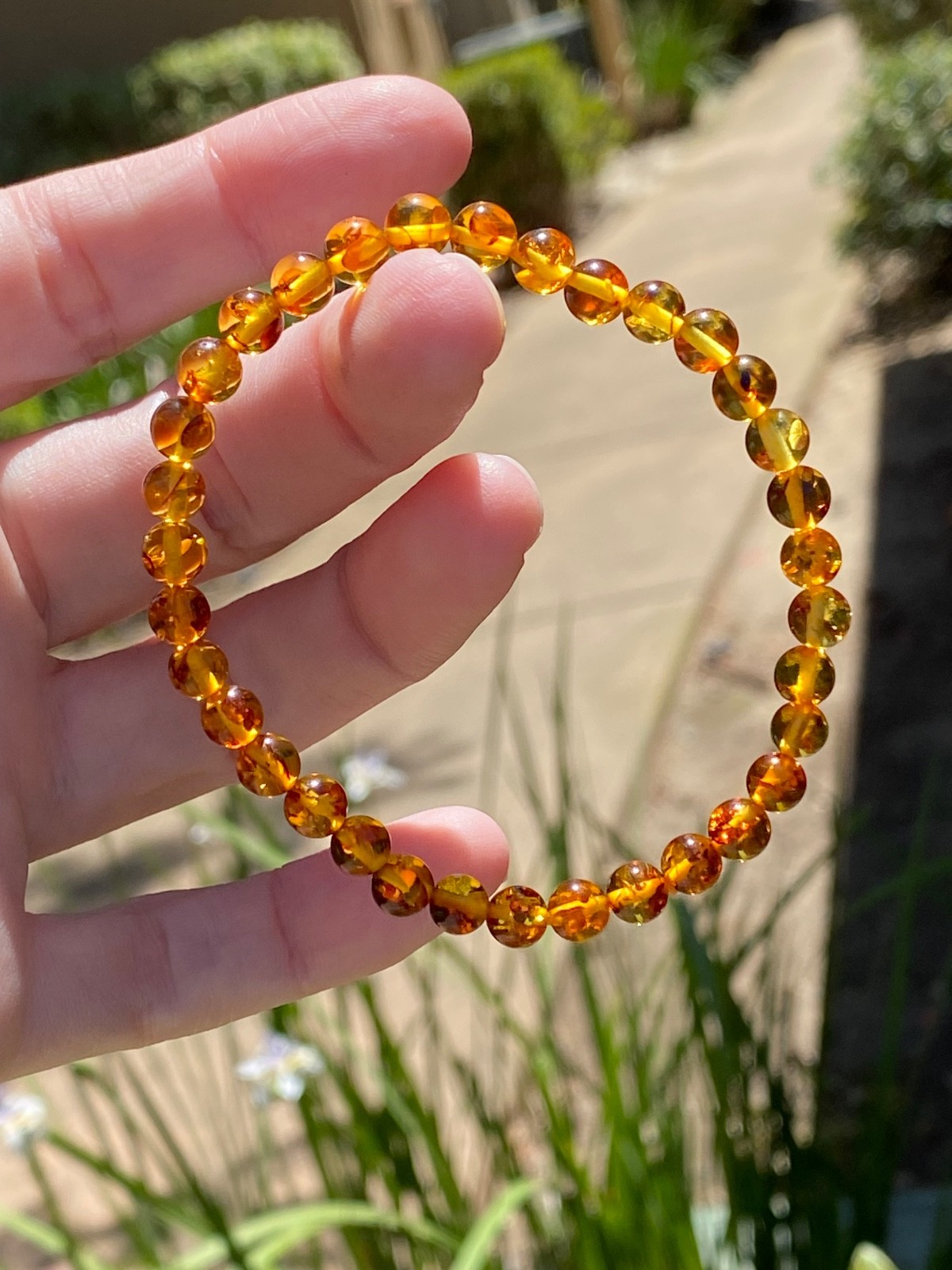 Flower Amber Stretch Bracelet – Approx. 5.8mm Beads – Fits Approximately 7 Inch