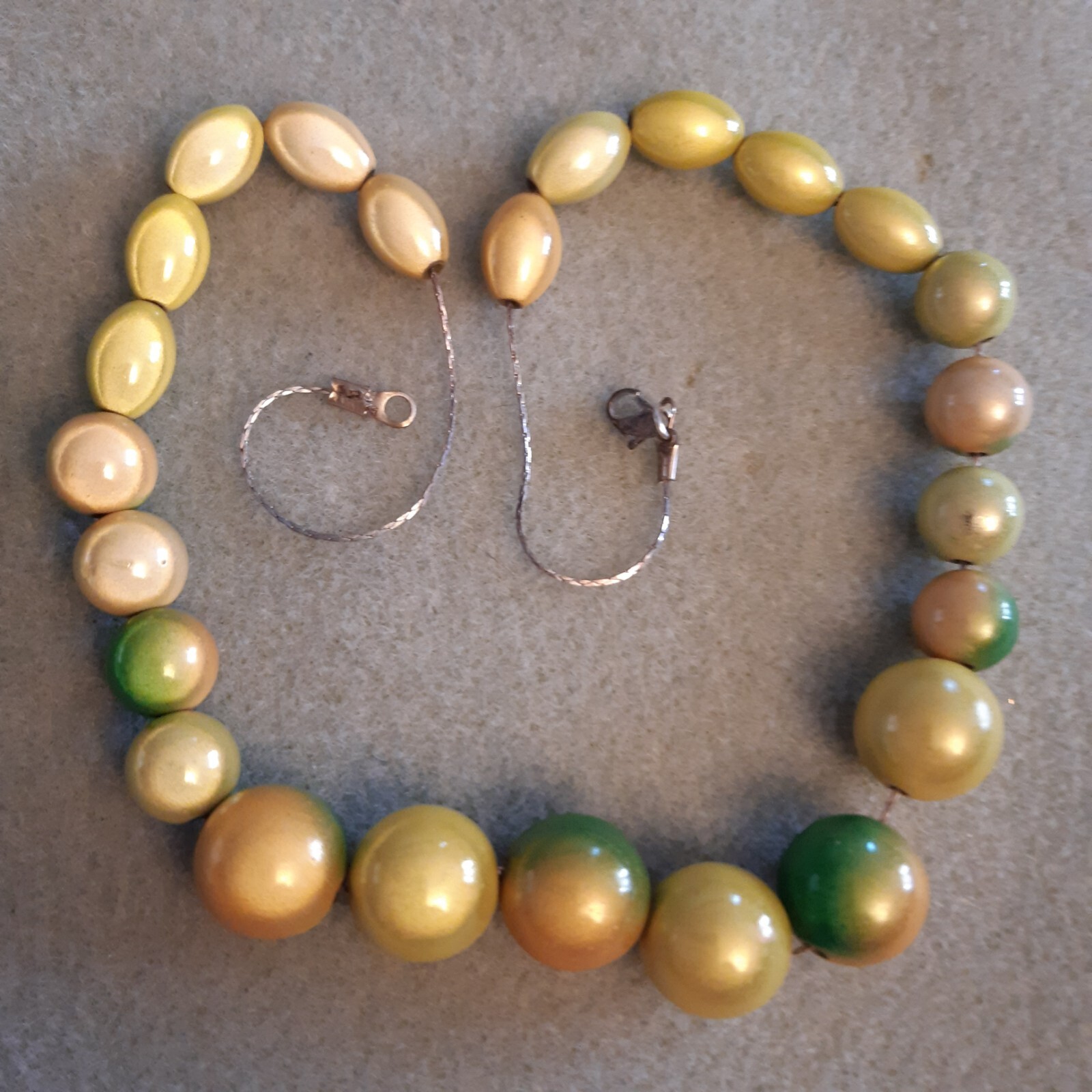 Blended green to yellow round and oblong miracle beads (necklace/earrings/set)