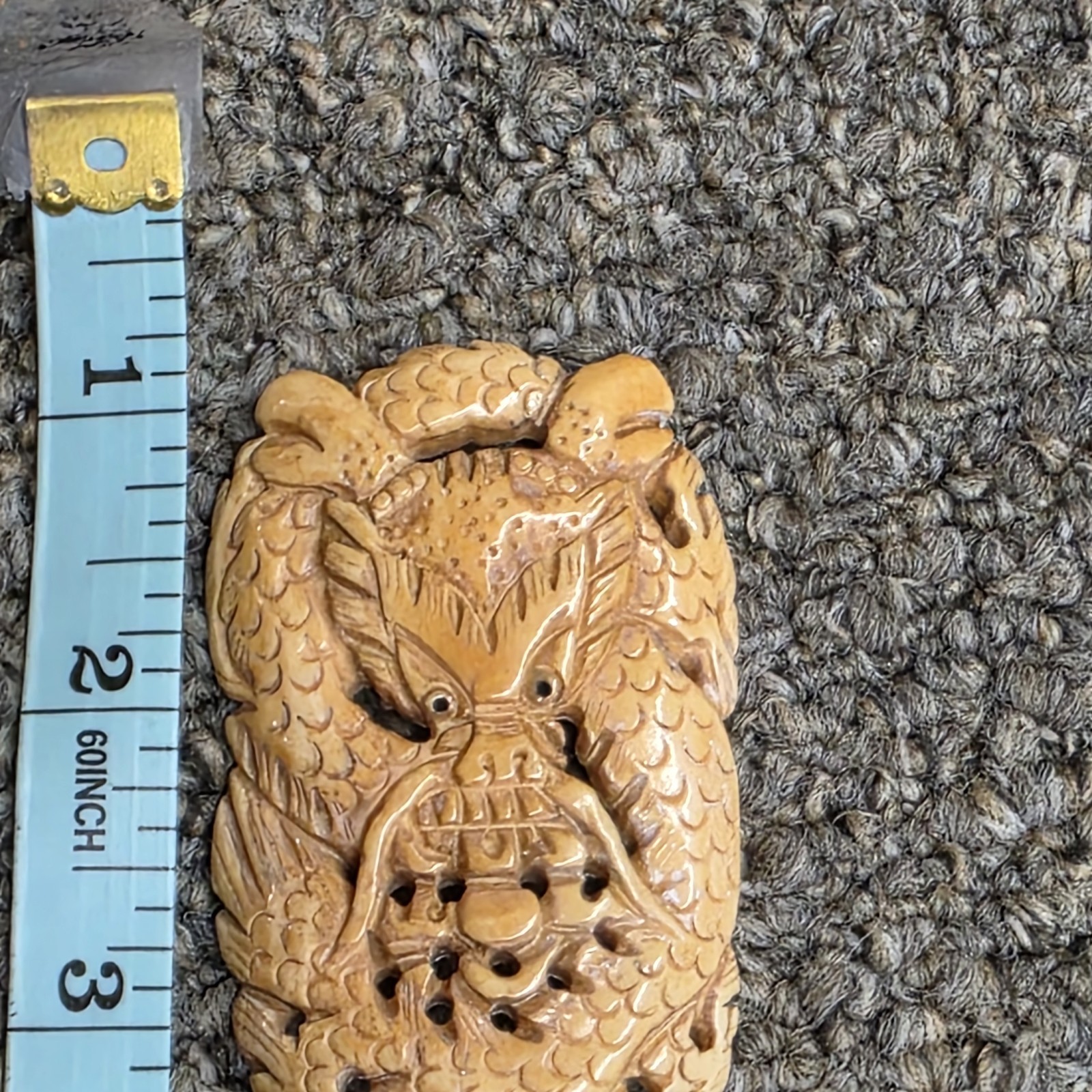 vigorous cow bone carved dragon pendant