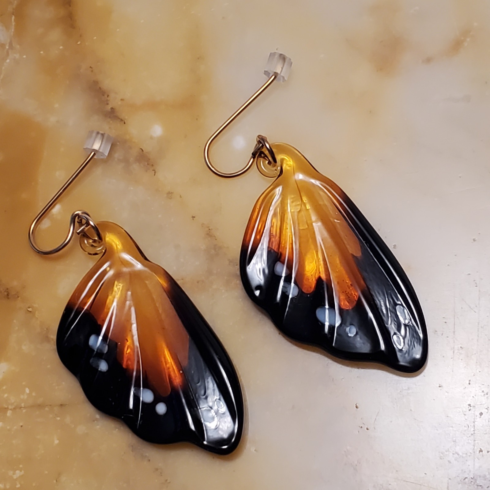 butterfly wing dangle earrings costume jewelry plastic resin brown white spots