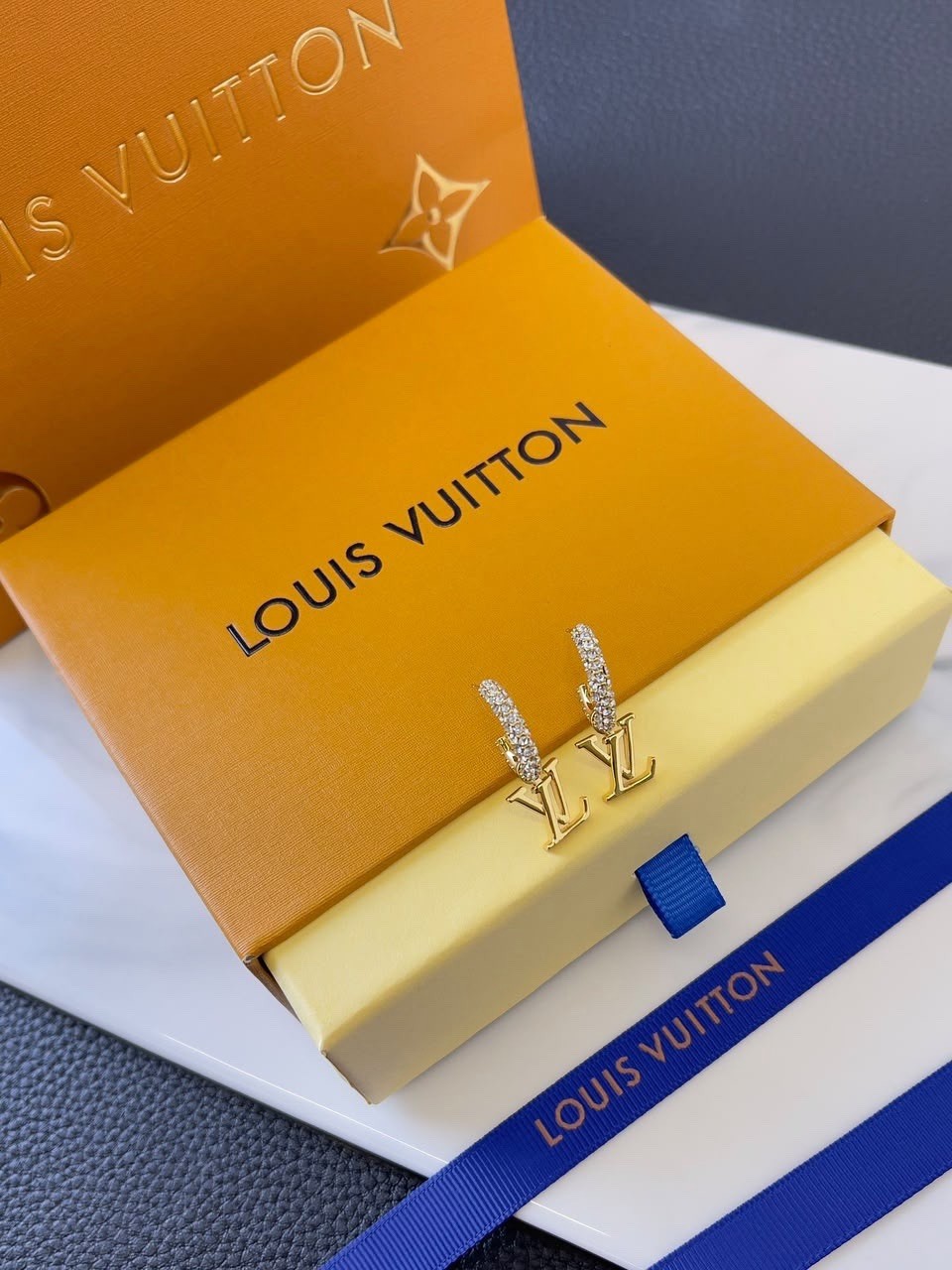 Louis Vuitton LV Logo Gold Tone Hoop Earrings Clear Crystal Accents Signed