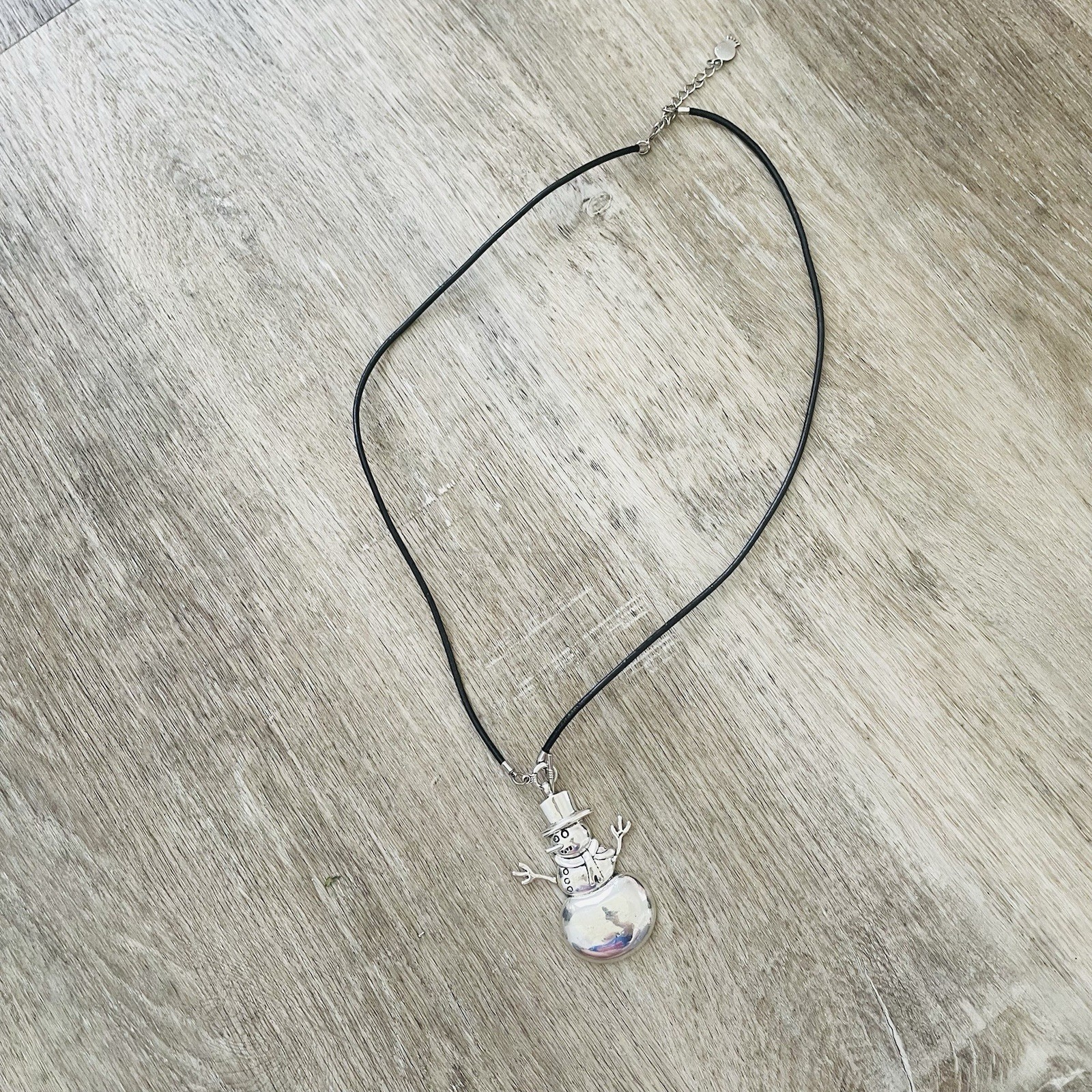 Silver Snowman Pendant Necklace – Black Cord