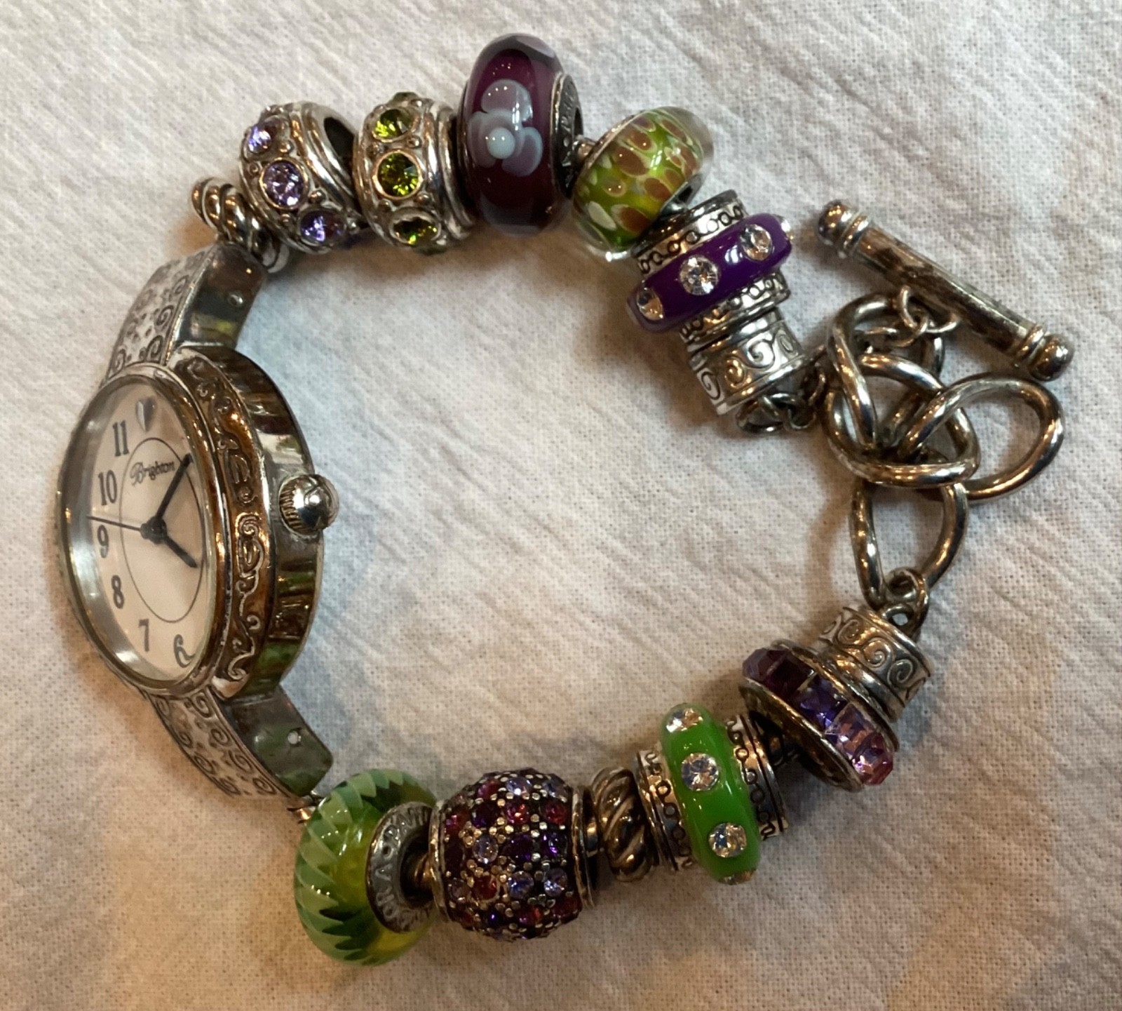 Brighton “Tustin” Silver Plated Watch with 11 Green and Purple Glass Beads