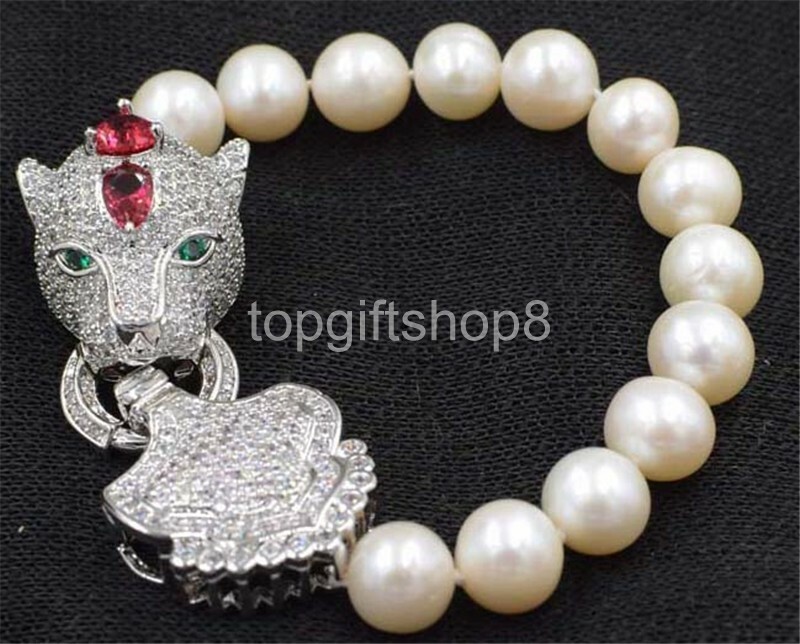 white freshwater pearl near round 10-11mm bracelet leopard clasp 8″