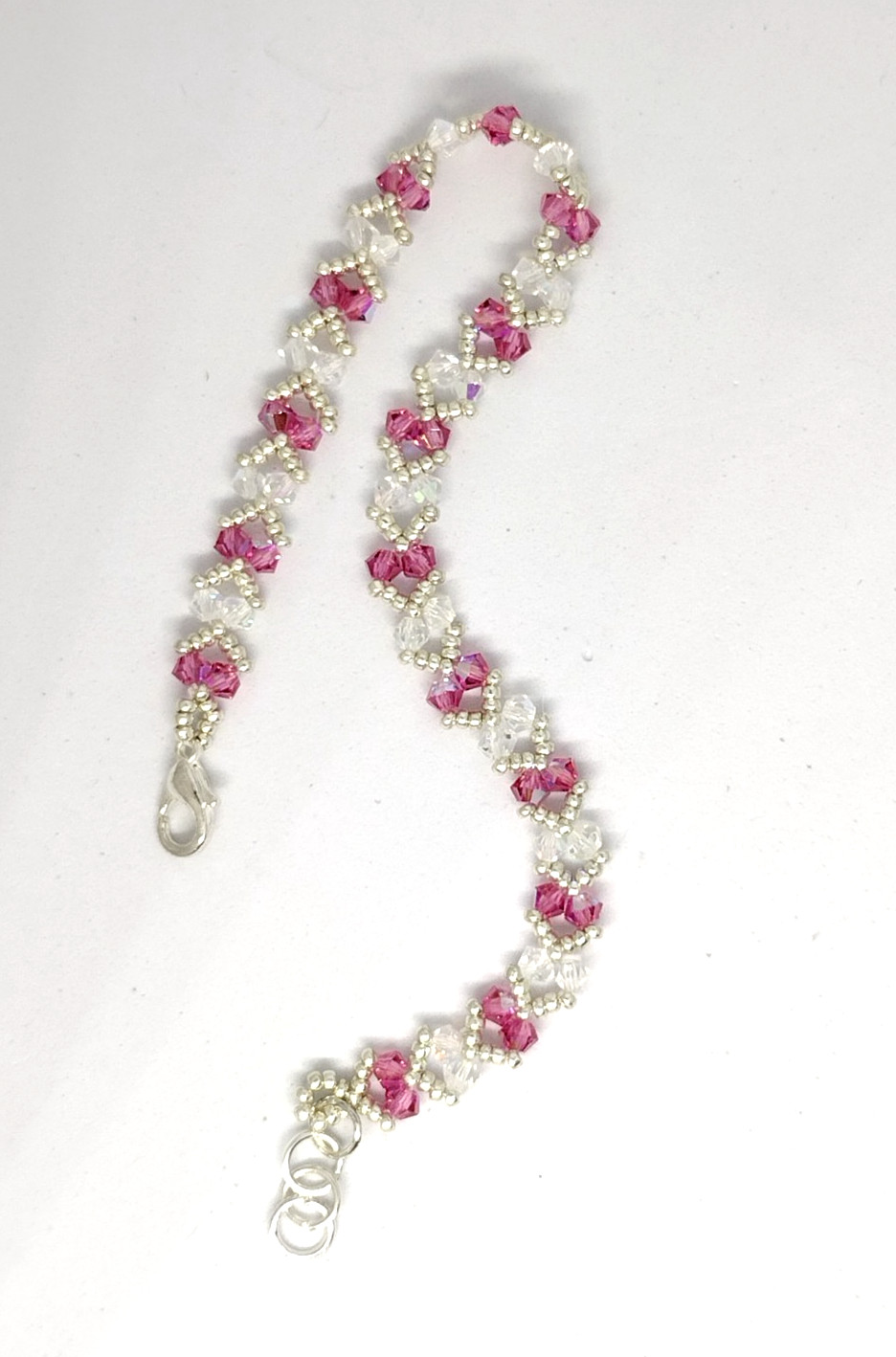 7-inch Bracelet 3mm Crystal Pink/White Sparkly Bicone Beads/Silver Miyuki Beads.