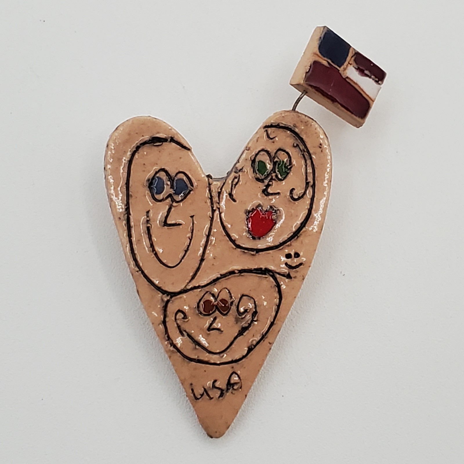 VTG Heart Brooch 2.25in Tan Porcelain Hand Crafted Floating Flag Faces USA Pin