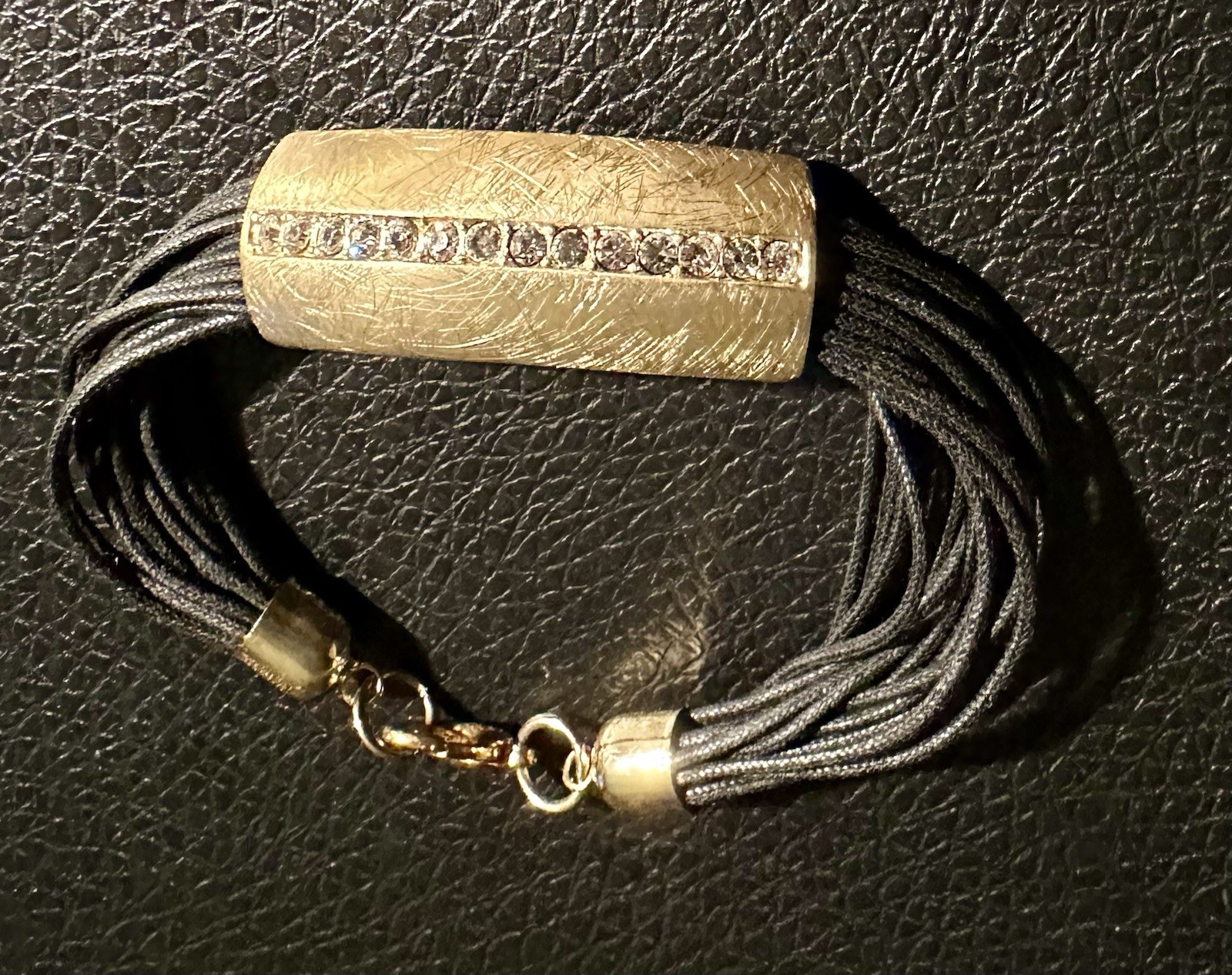 multi-strand black cord bracelet