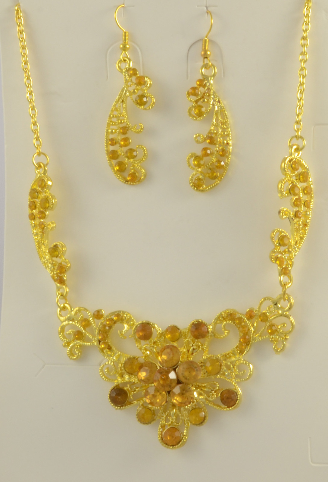 GOLD, GREEN, CLEAR,TURQUOISE, TOPAZ & BROWN SILVER/GOLD TONE FLOWER CRYSTAL SET