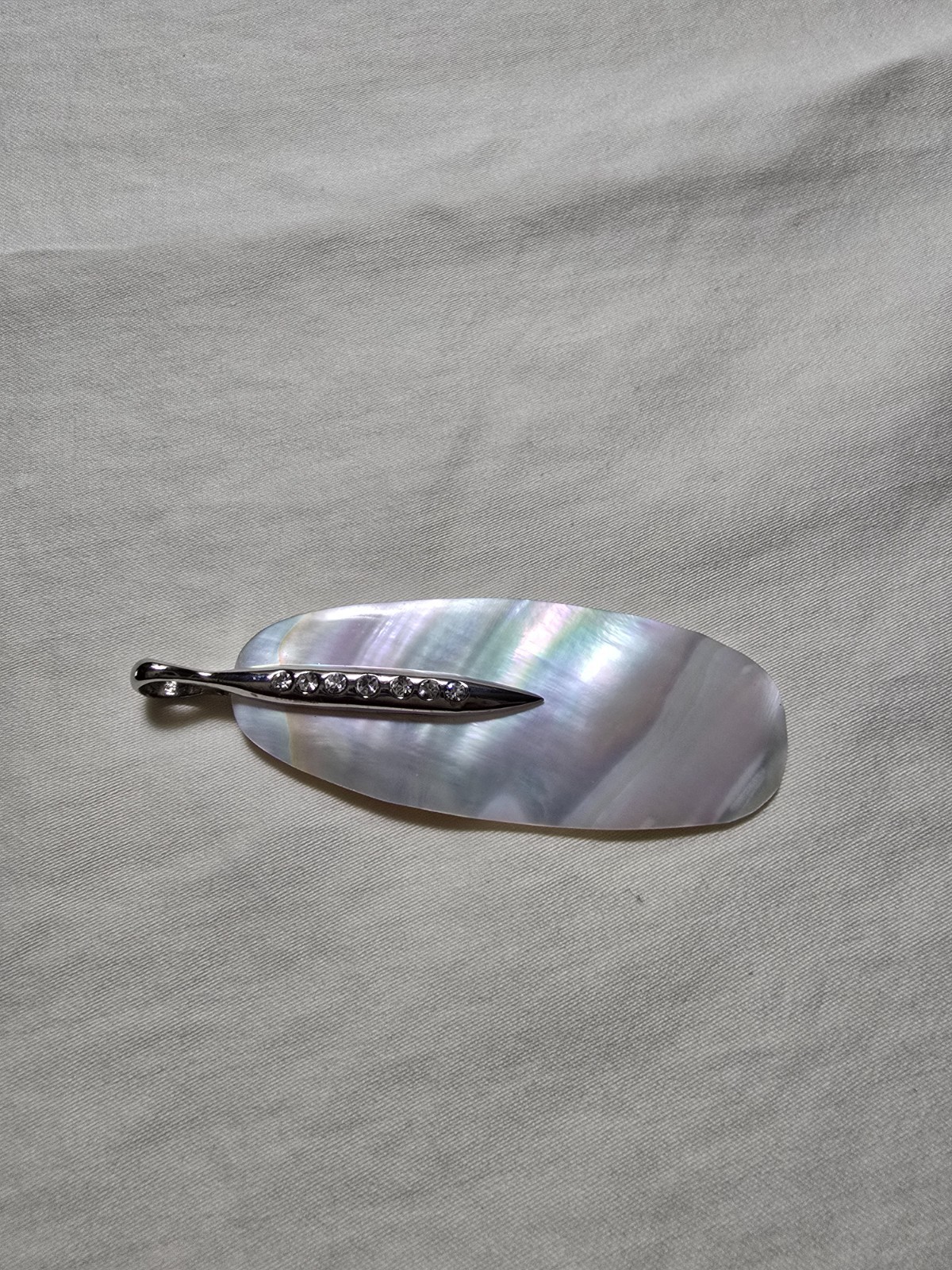Mother of Pearl (MOP) Elongated Pendant in silver tone adorned with crystals