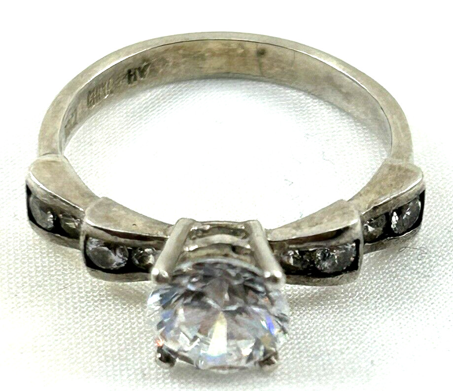 Signed DQ DIAMONIQUE Sterling Silver Solitaire Band with Accents Ring Size 6.75