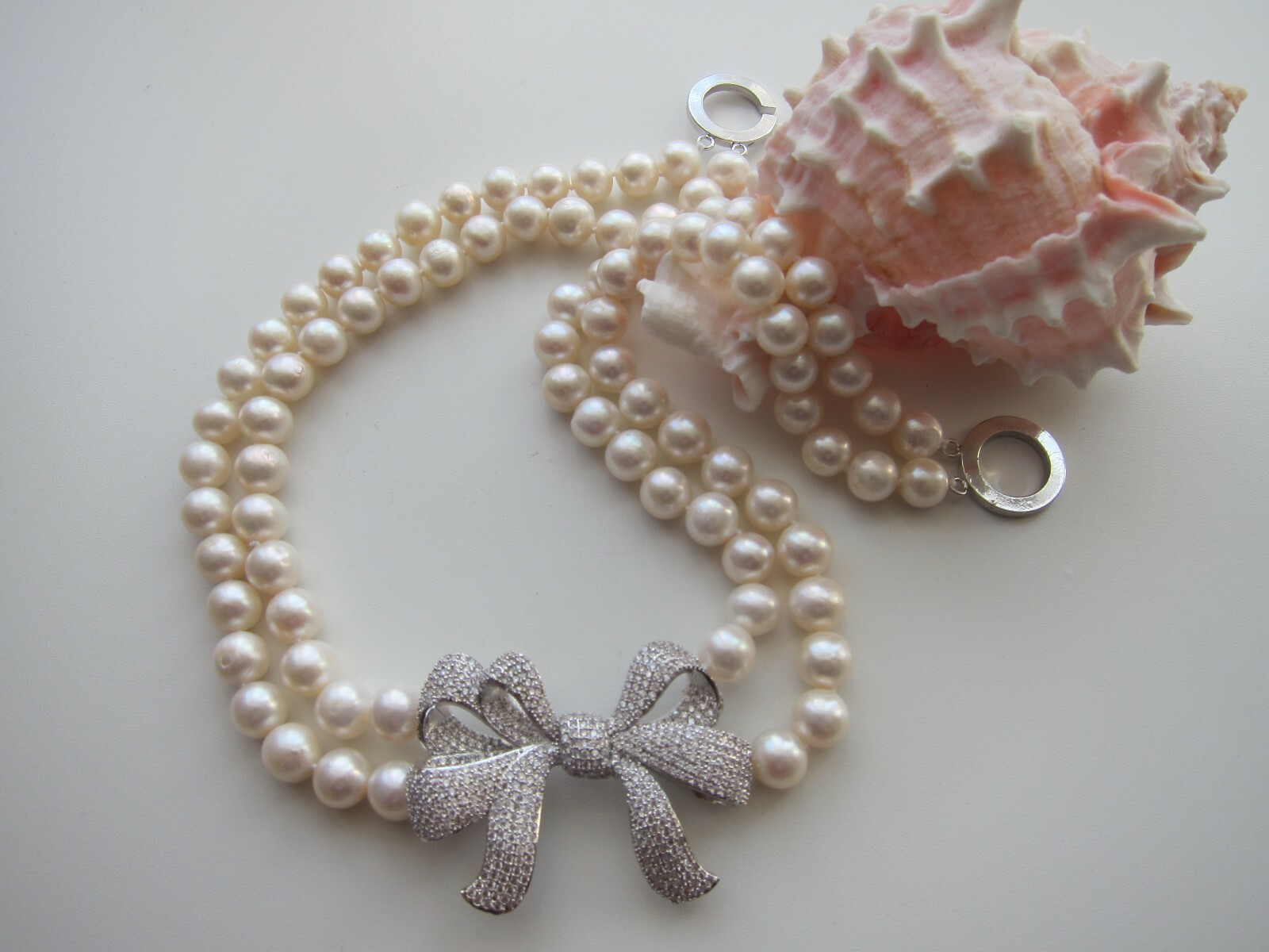 2 Row 8.5-9.5 mm White F.W. Cultured Pearl Necklace w Pave Bow 18″ 19″ long.