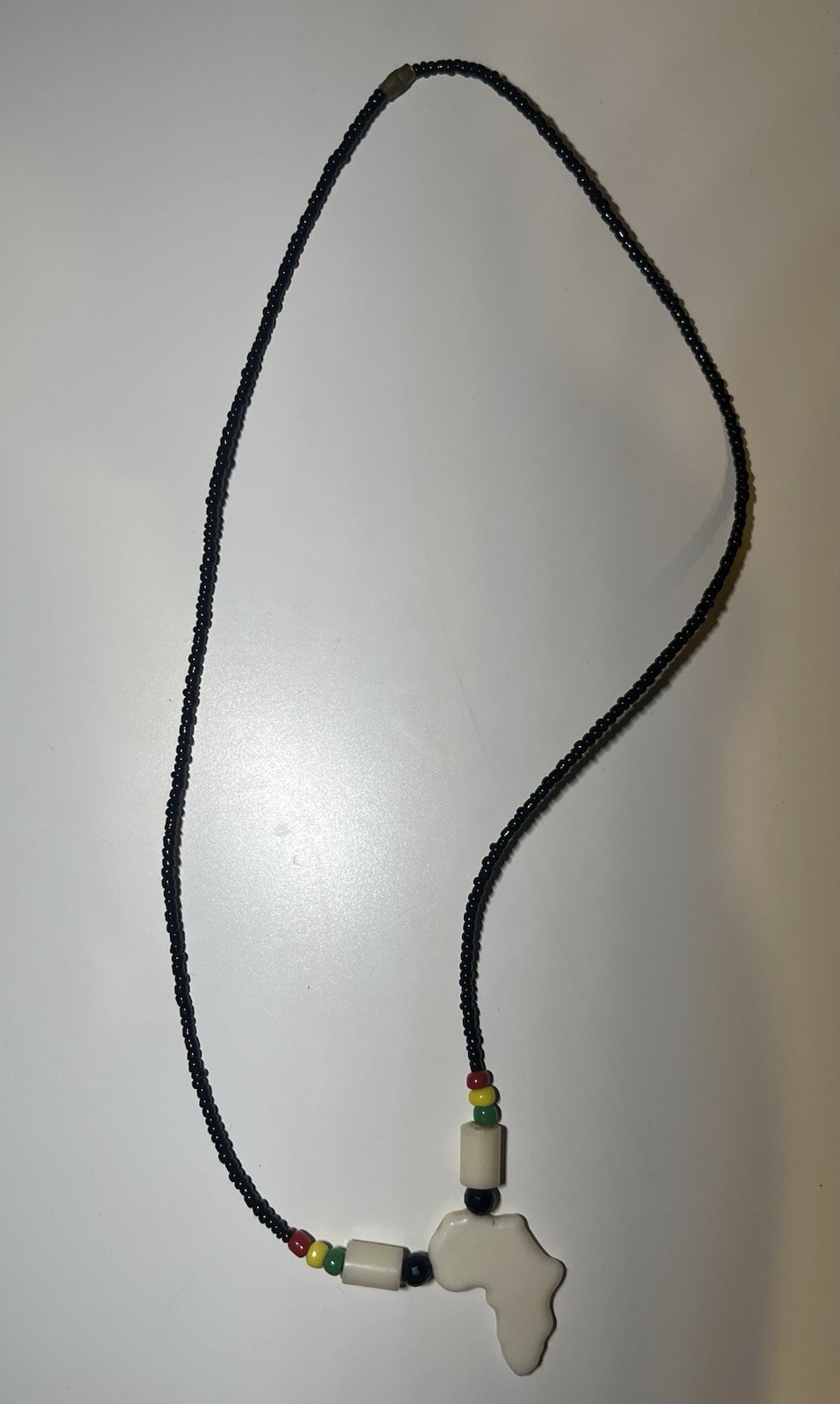 Handmade Beaded Necklace Black Yellow And Green With Africa Pendant – From Ghana