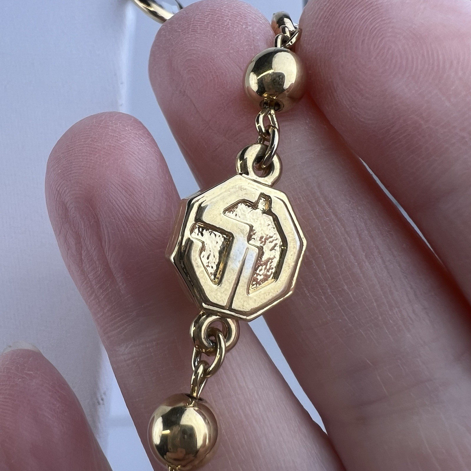 St. John Vintage 38″ Long Gold Tone Logo Necklace Clear Bezel Stations