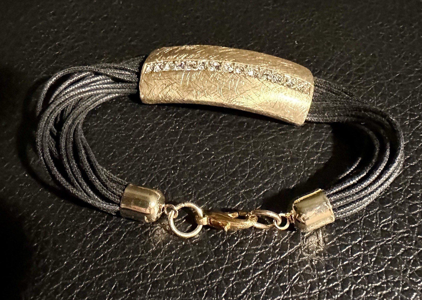 multi-strand black cord bracelet