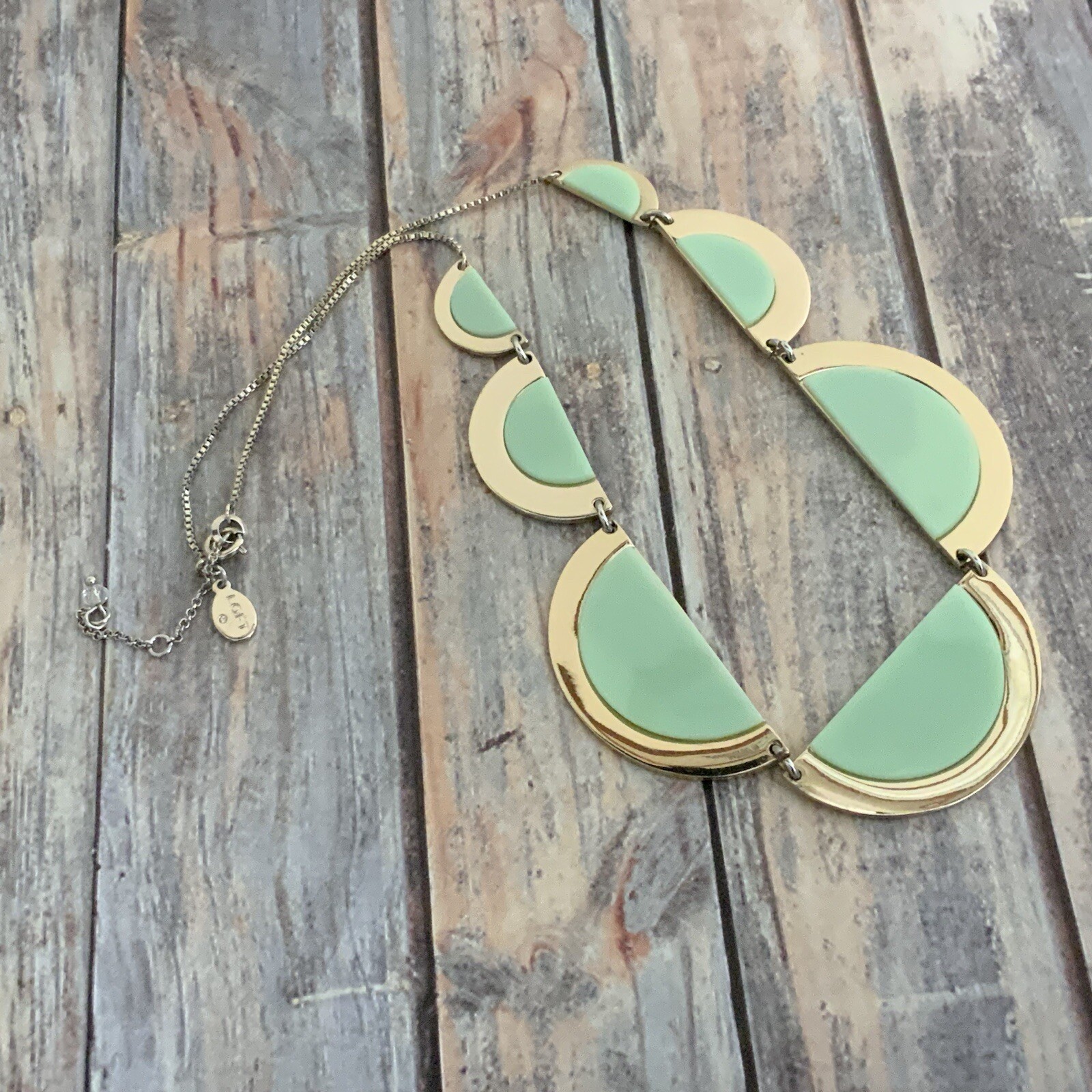 Gold tone LOFT mint green crescent link statement necklace