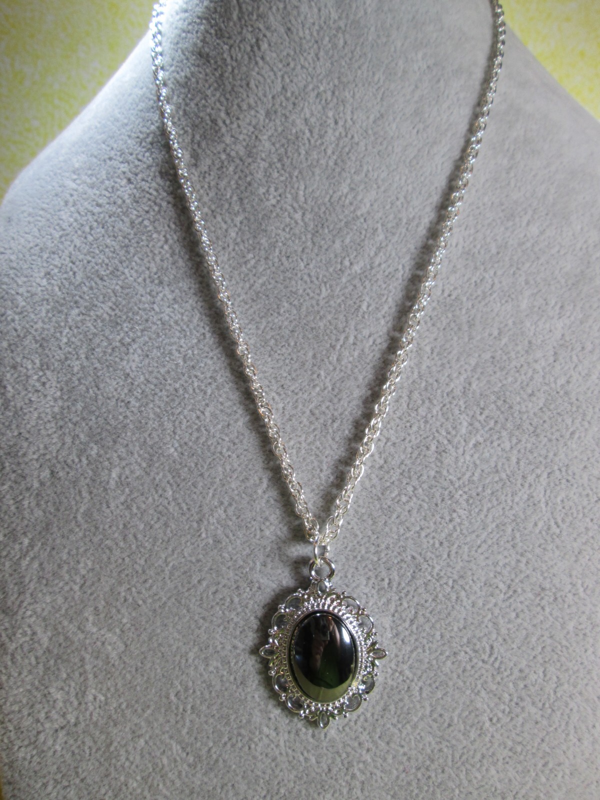 Genuine Hematite Oval Pendant w/ 18″ Silver Plated Rope Chain / N