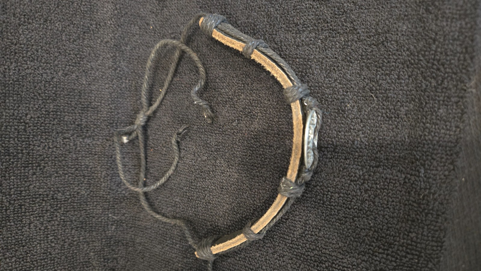 Leather tied Choke black w/ metal emblem, used good condition