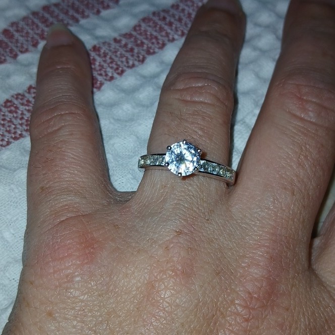 Sterling silver round white CZ solitaire with accents band ring. Size 8