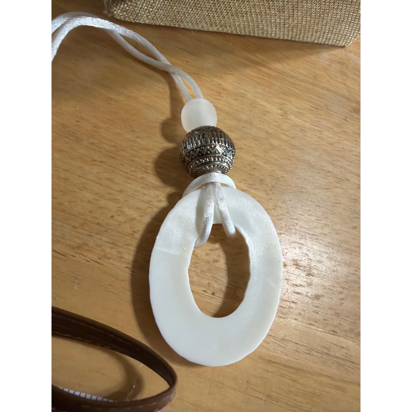 Boho White Carved Resin Ring Pendant Necklace Silver Tone Bead White Cord Artsey