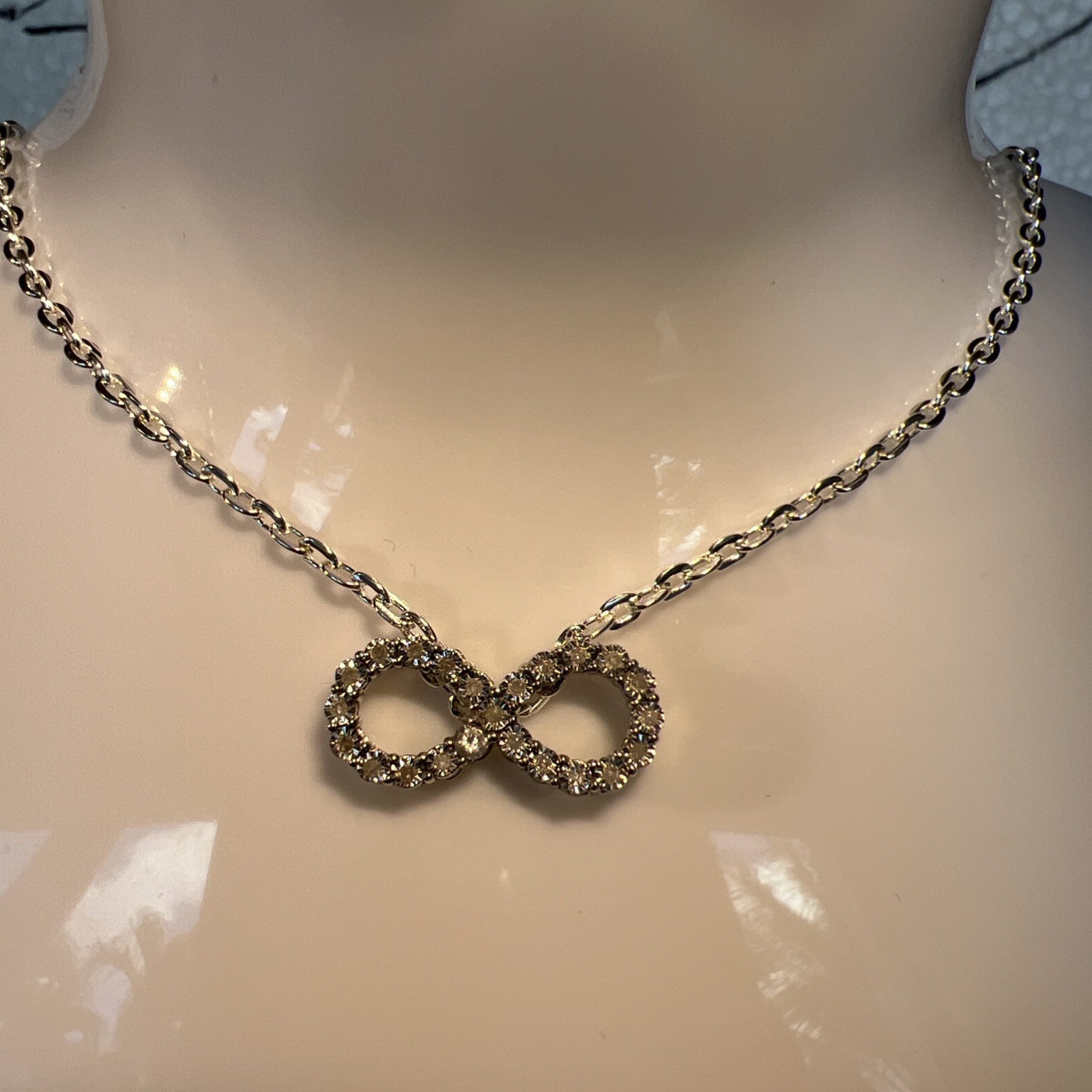 Brilliant Infinity Necklace With silver Chain, new without tags, see photos