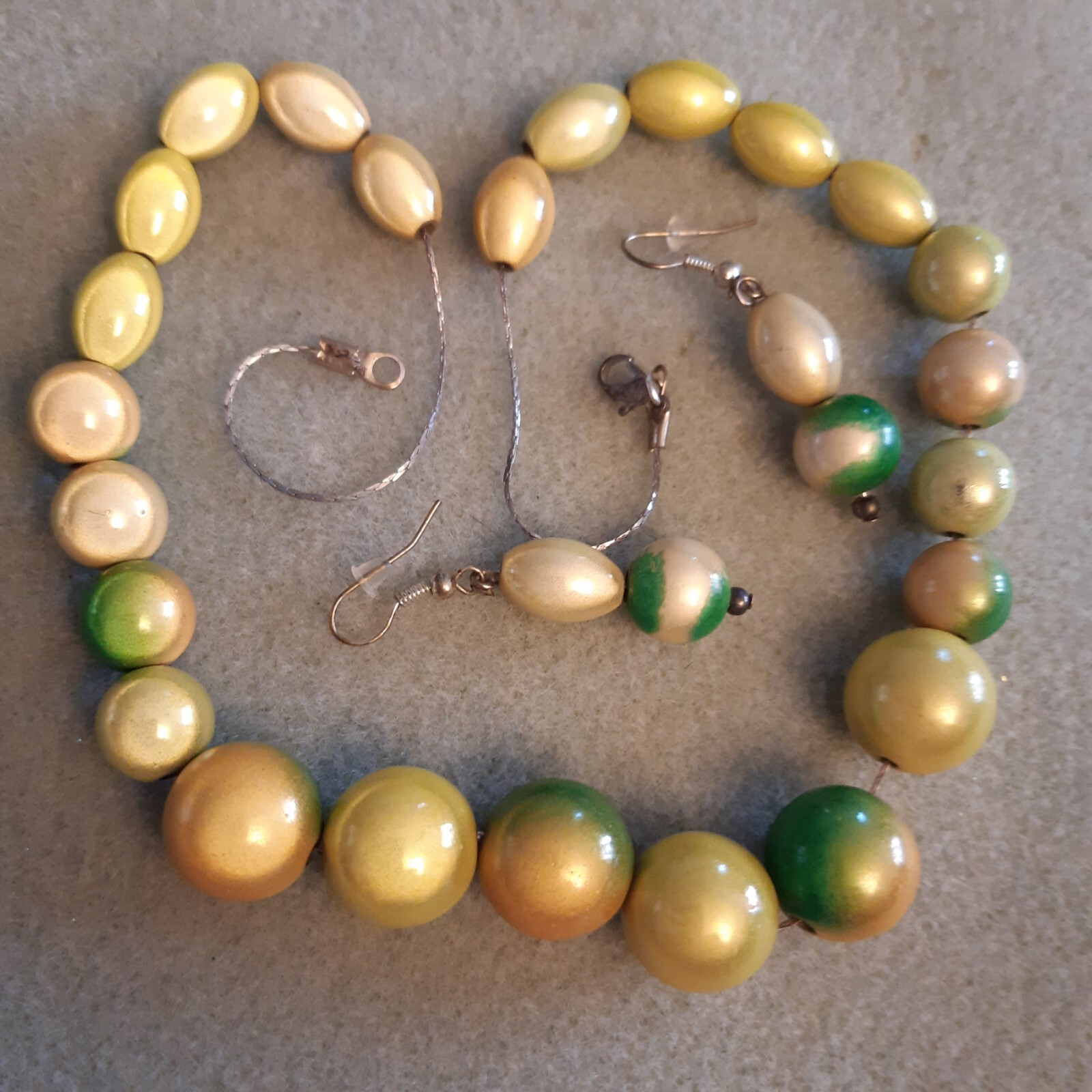 Blended green to yellow round and oblong miracle beads (necklace/earrings/set)