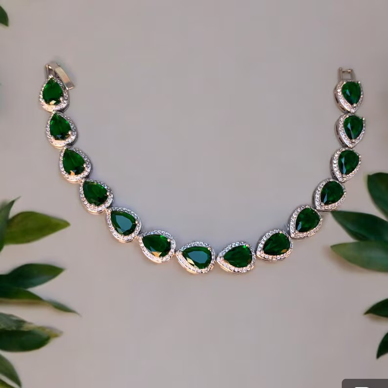 10 Ct Pear Cut Simulated Emerald Women HaloTennis Bracelet 14K White Gold Plated