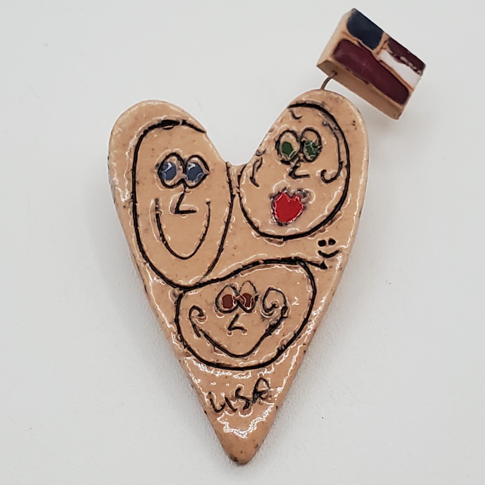 VTG Heart Brooch 2.25in Tan Porcelain Hand Crafted Floating Flag Faces USA Pin