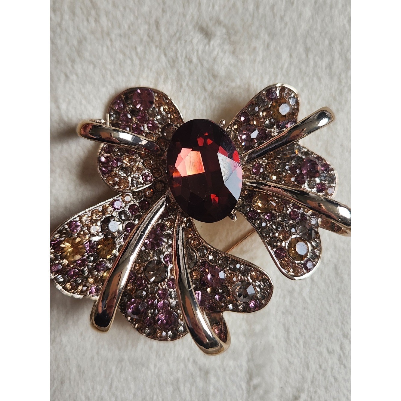 Gold-Tone Bow Brooch with Garnet-Center and Pink/Champagne Crystals