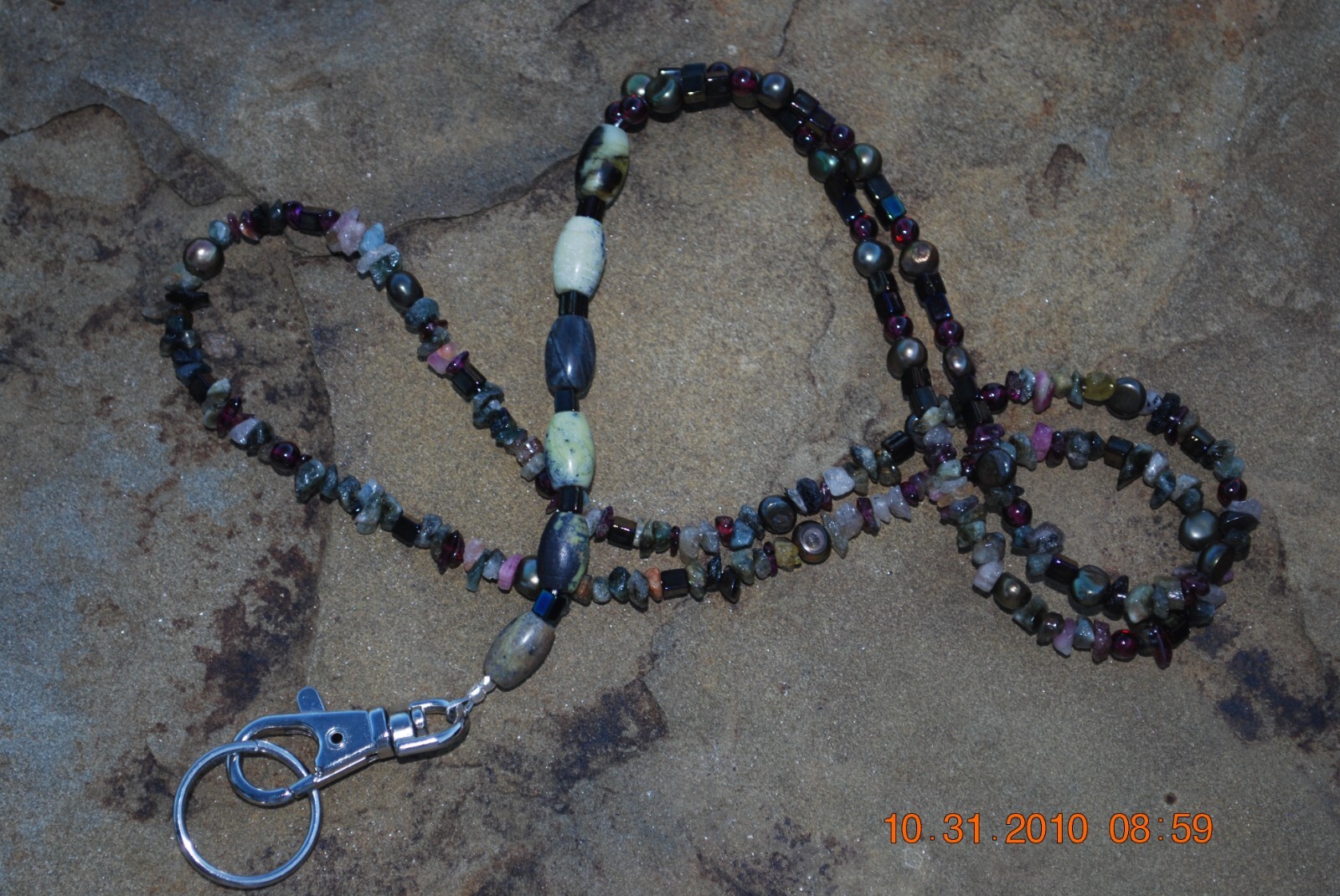 Lanyard, 34″ multi-stone in color, with lobster claw clasp and key ring