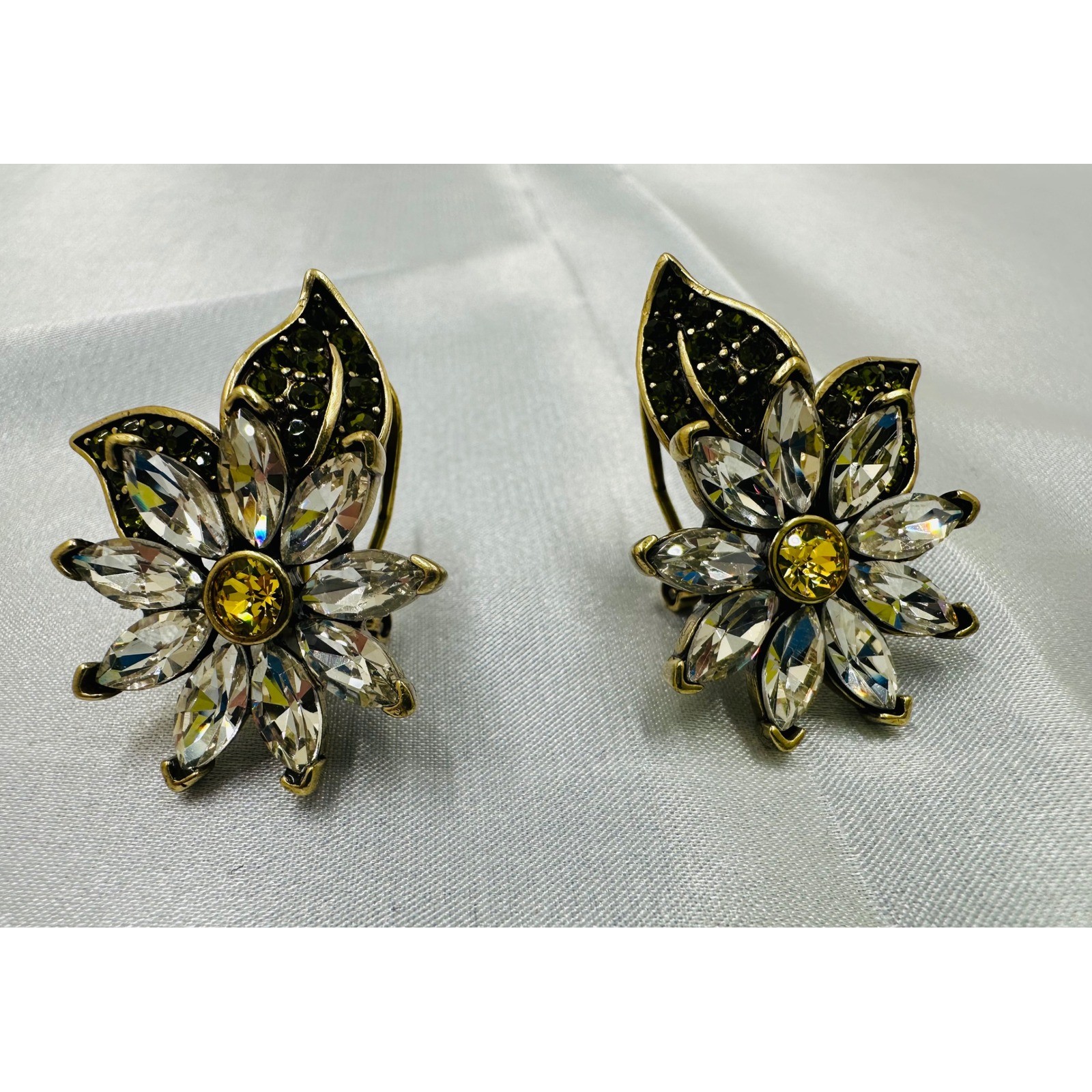 Heidi Daus Crystal Daisy Flower Omega Back Earrings Bronze Tone Green Yellow