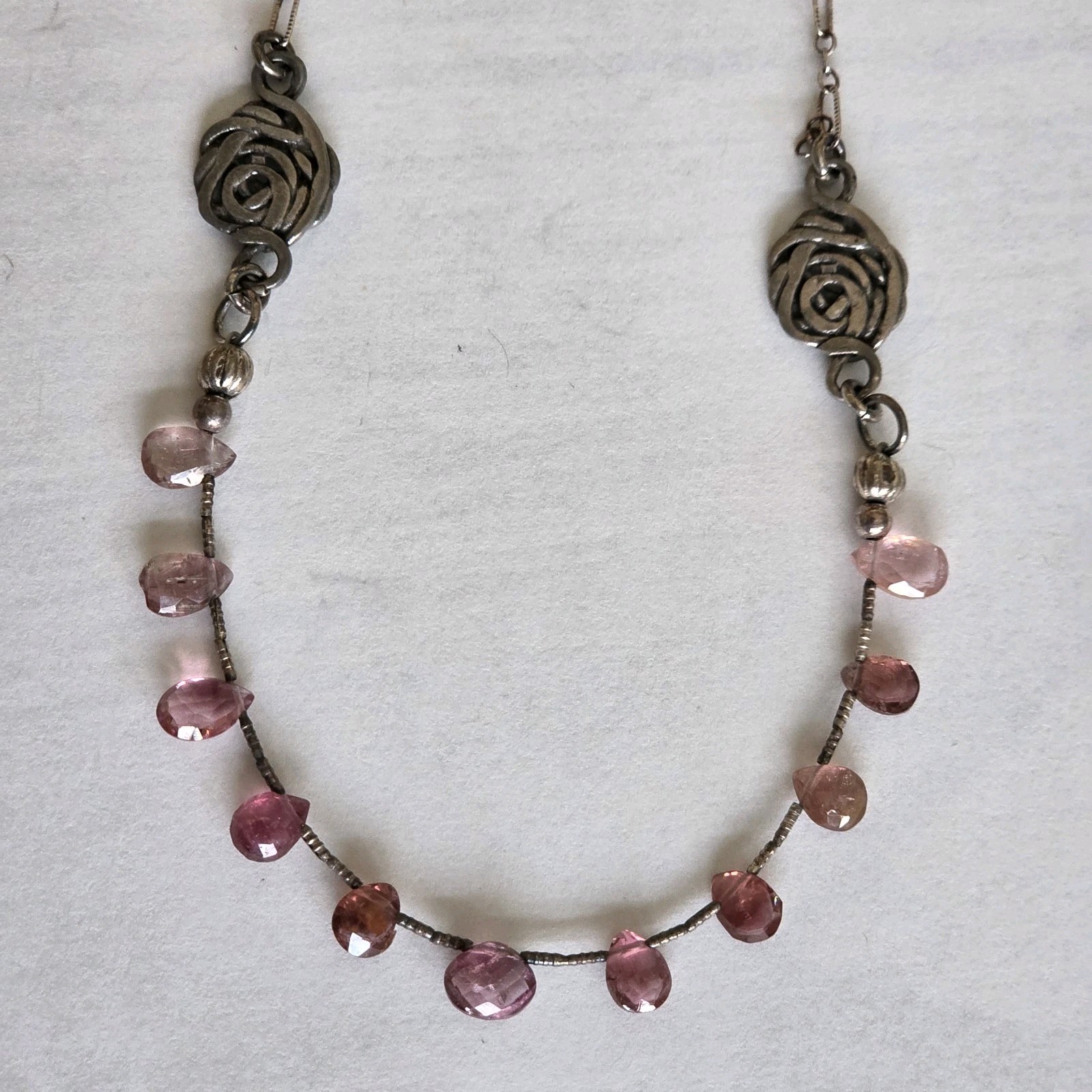 Sterling Silver chain w/floral Links and Beautiful Pink Tourmaline. Stones match