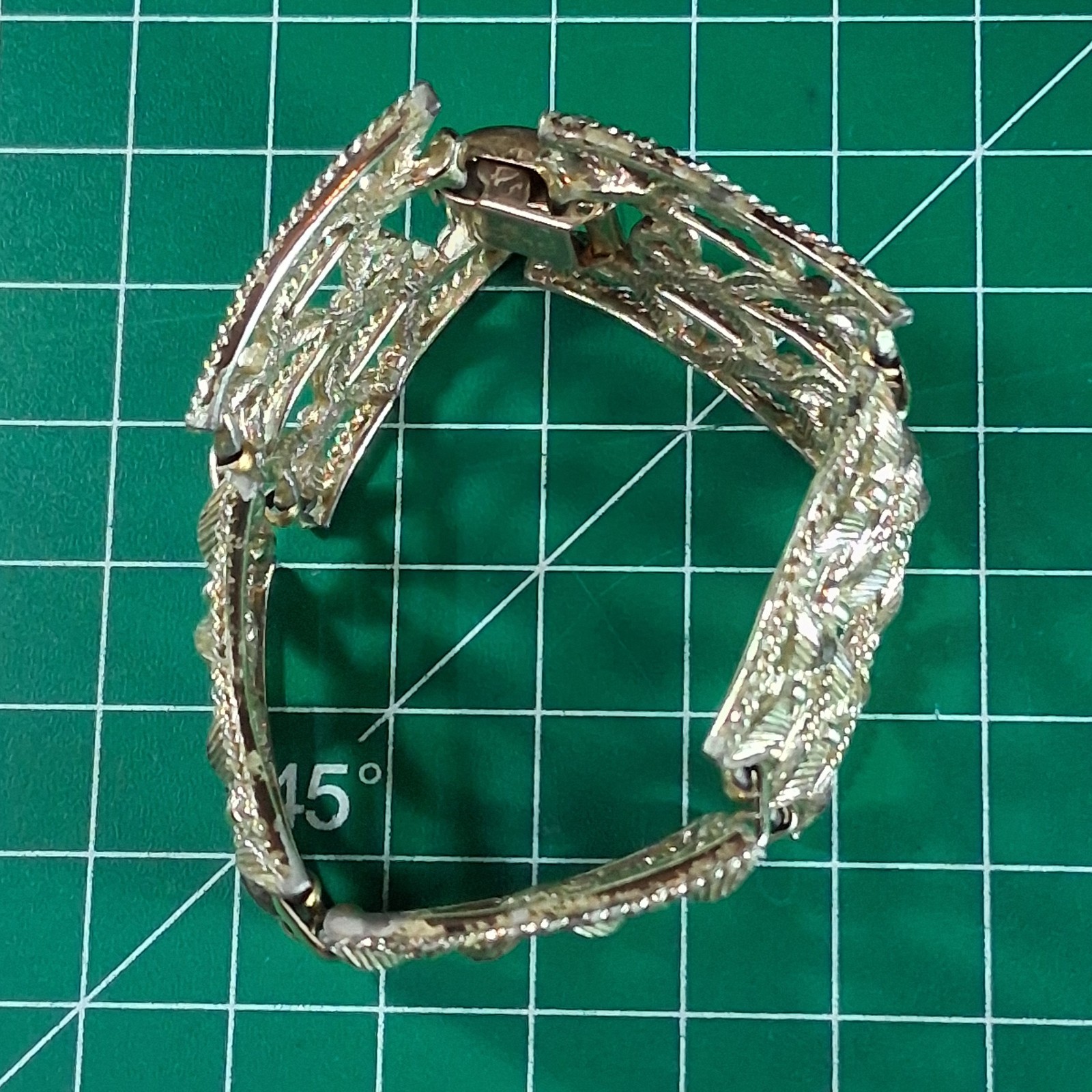 Vintage Cora Silver Tone Wide Band Floral Design Fold Over Clasp Bracelet