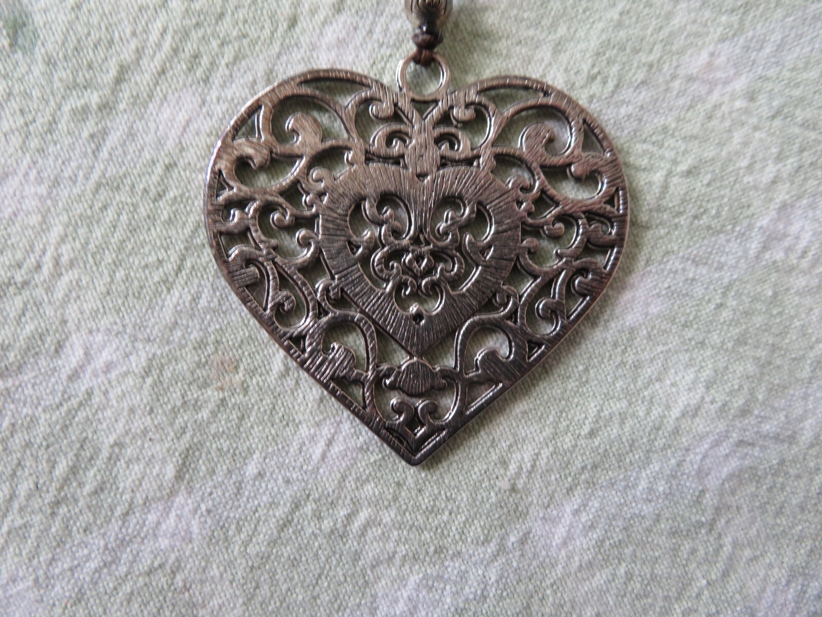 VINTAGE – APPROX. 20″ LONG BLACK & SILVER BEADED- HEART SHAPED NECKLACE