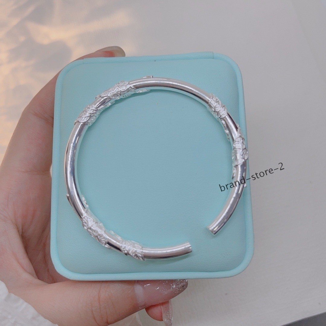 BM Round solid openwork relief copper-plated silver peony bracelet 30g
