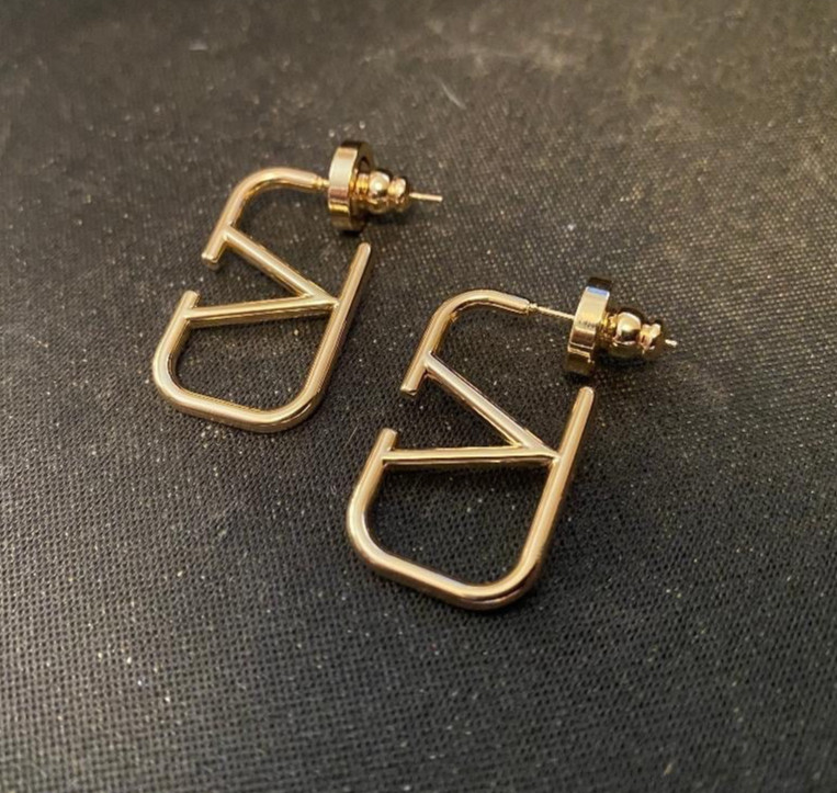 Stunning Pre loved Womens Valentino Gold Tone V Logo Earrings.