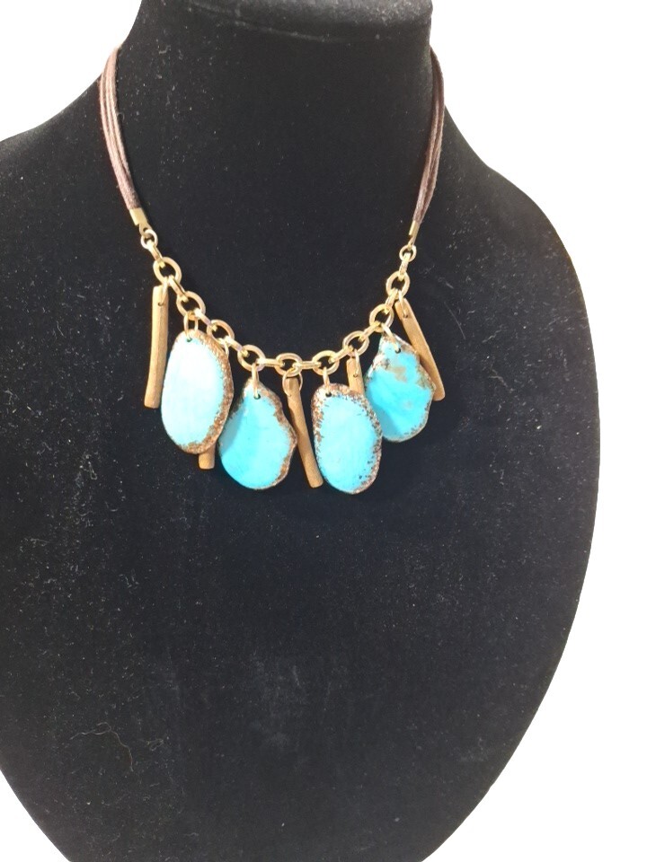 ladies turquoise Necklace On Gold And Leather Can Be 16 Ins To 20 Ins Long