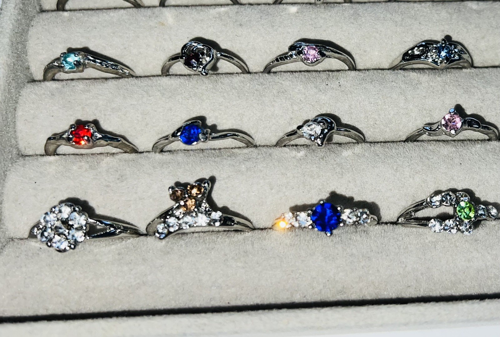 Bundle Of 50 Lovely Silver Coloured Rhinestone RINGS Single & Multiple Gem Stone