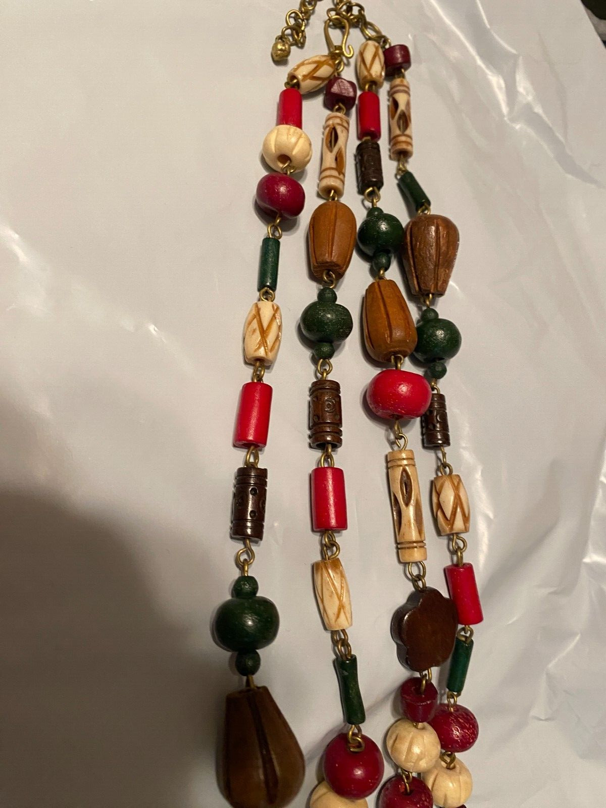 Beaded Necklace about 28 Inches long with hook and eye closure, pre-owned