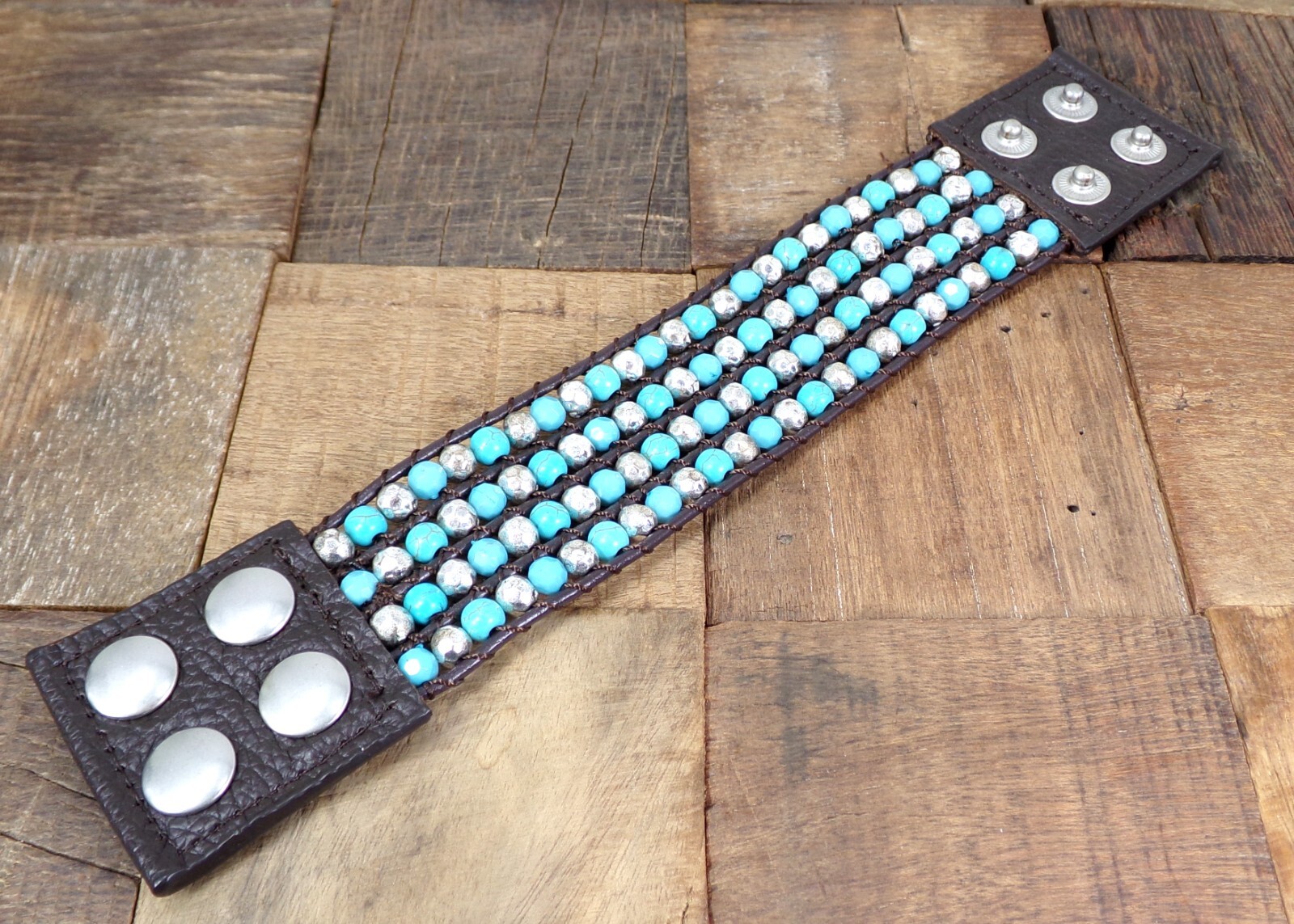 Wide turquoise and silver beaded leather bracelet , snap closure, brown leather