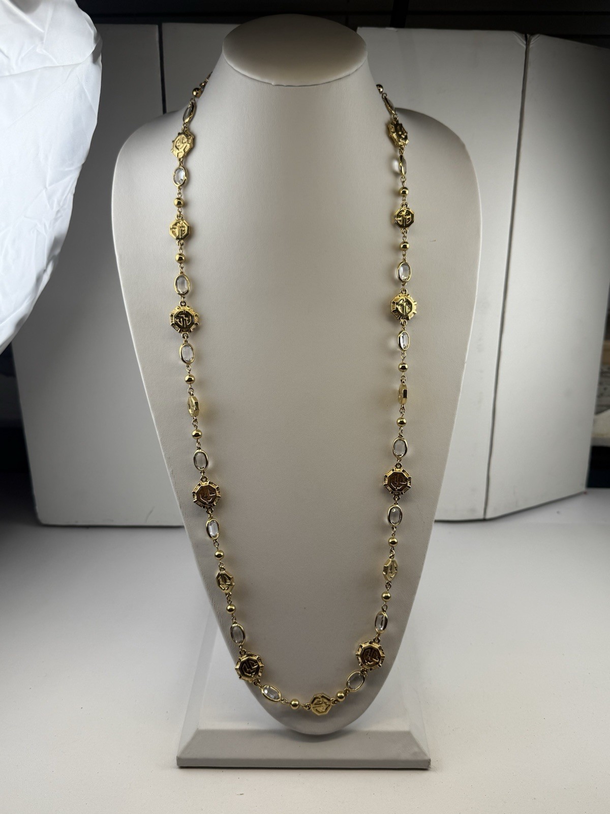 St. John Vintage 38″ Long Gold Tone Logo Necklace Clear Bezel Stations