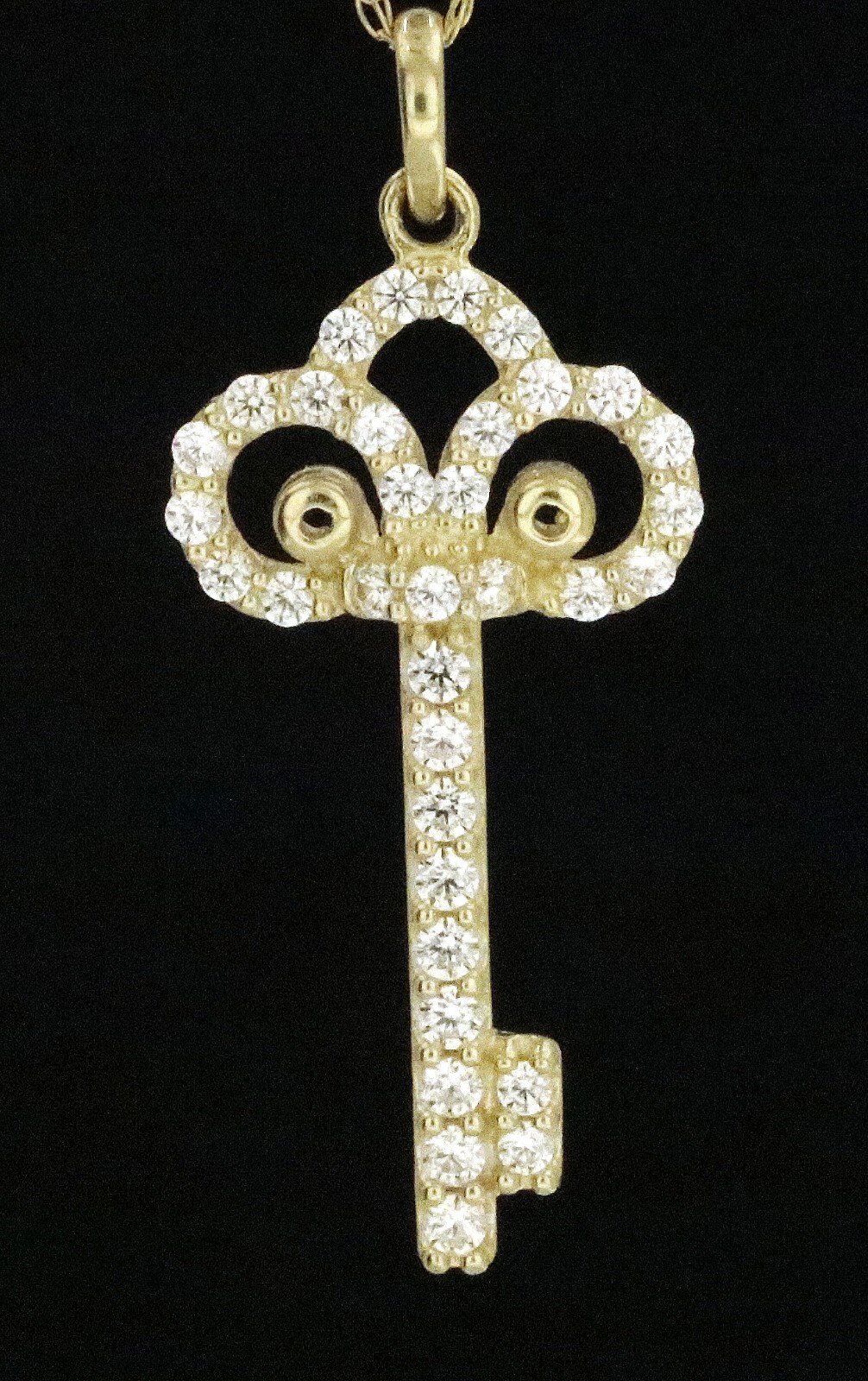 10K Y/Gold 0.93gr Pendant ” Key ” 12x29mm With CZ #566