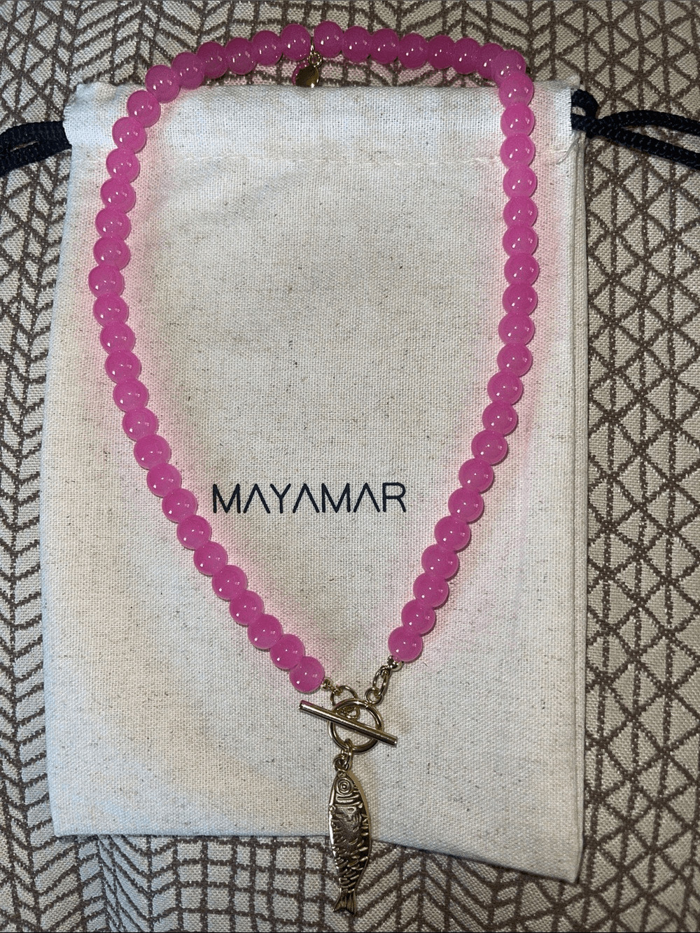 Pink Beaded Necklace with Gold Fish Pendant toggle