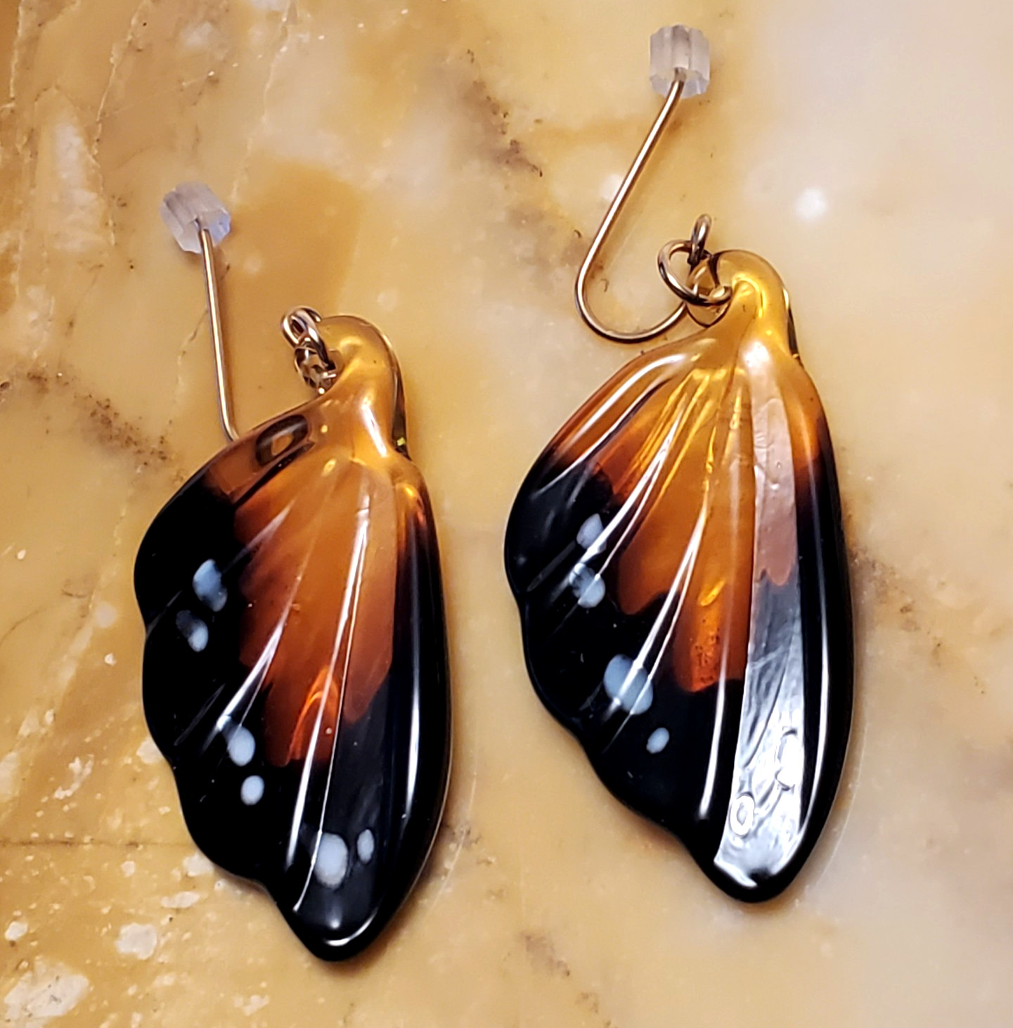 butterfly wing dangle earrings costume jewelry plastic resin brown white spots
