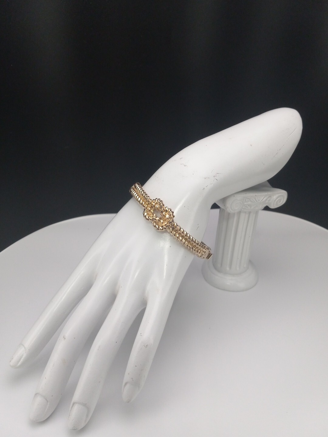 Gold Tone Love Knot Textured Twisted Design Size 7 Push Lock Bracelet