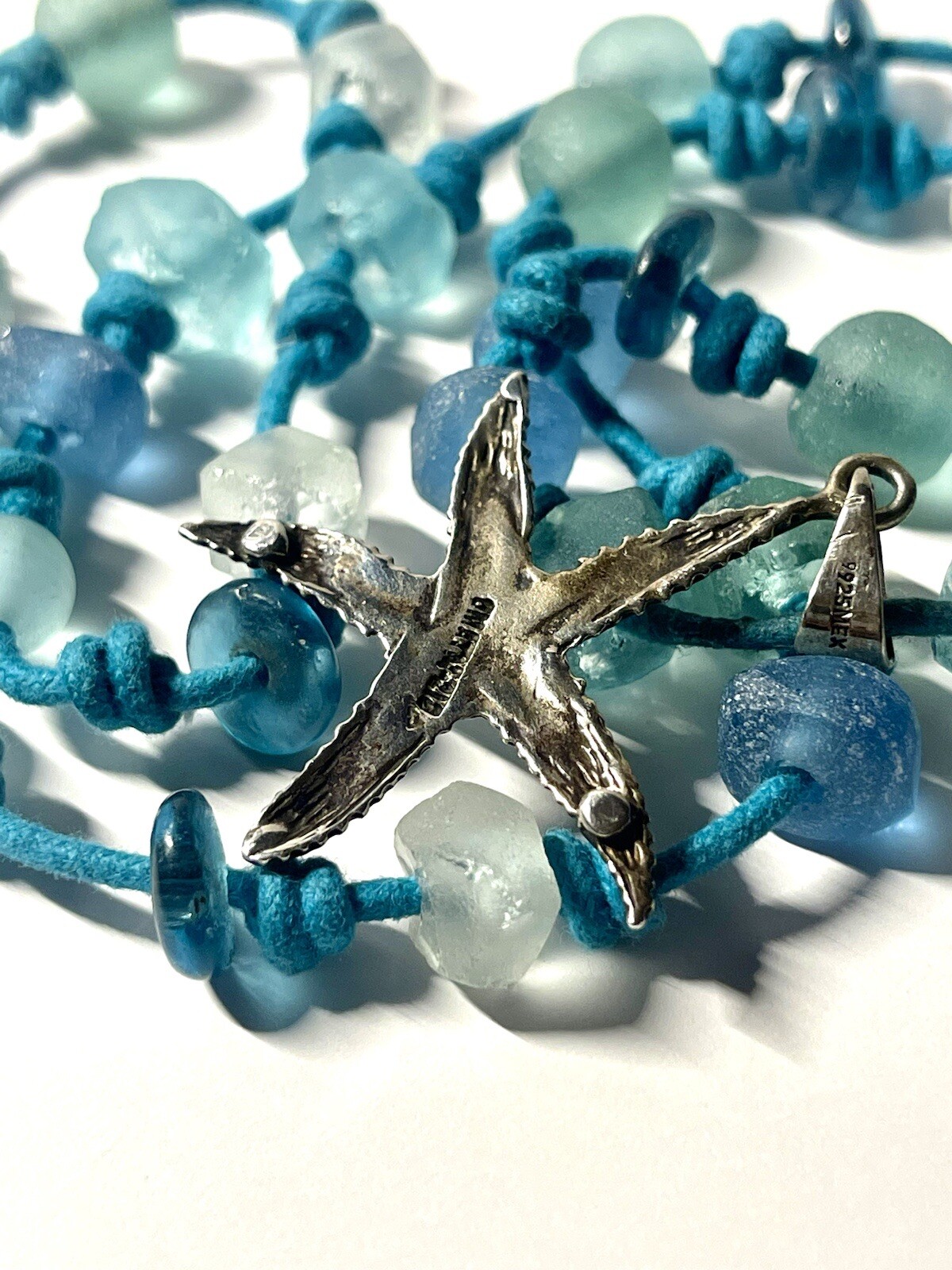 Sterling 925 Star Pendant On Fashion Blue Chord Necklace WithChunky Blue Accents